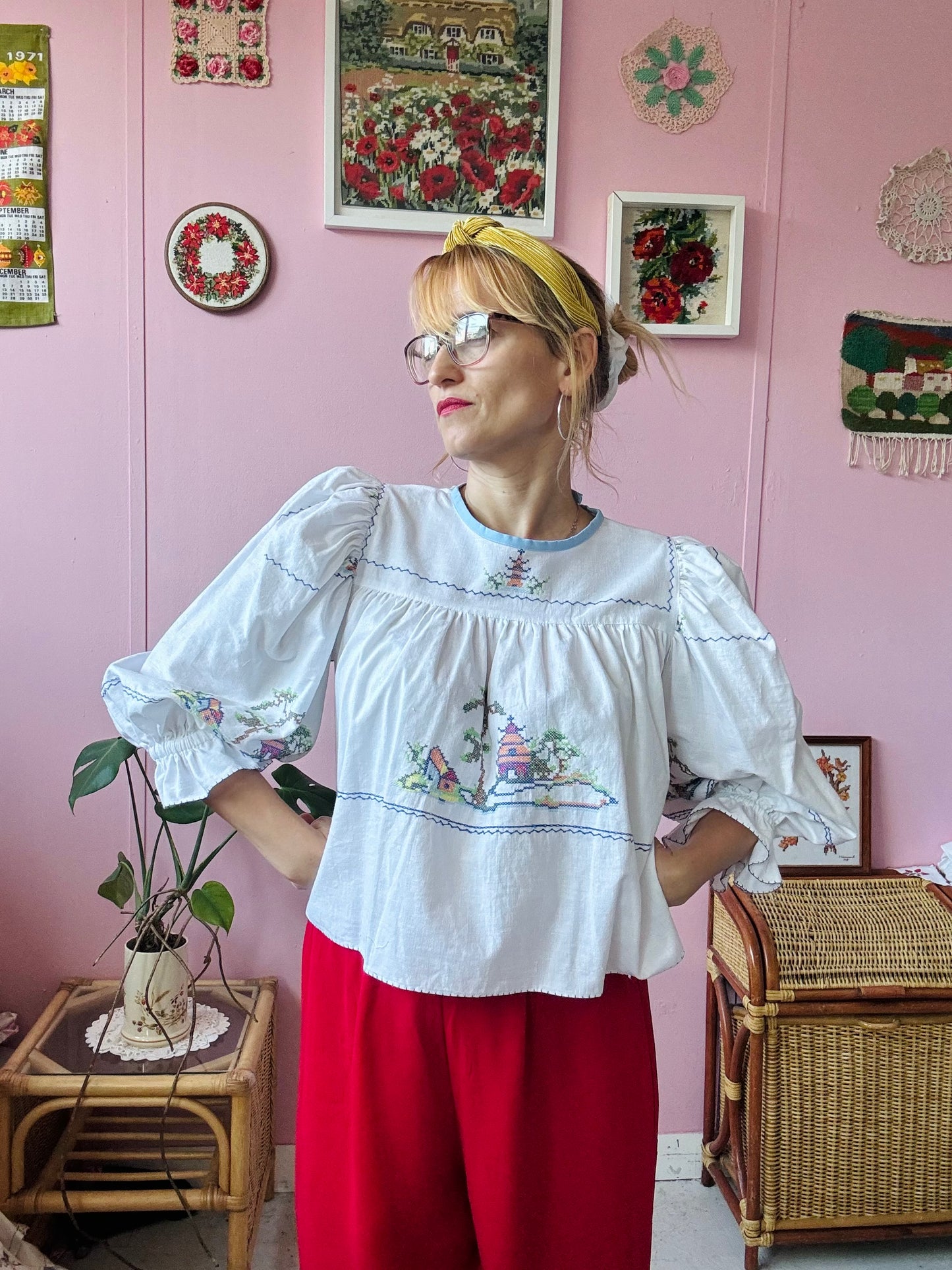White cotton blouse with cross stitching and frilly sleeves
