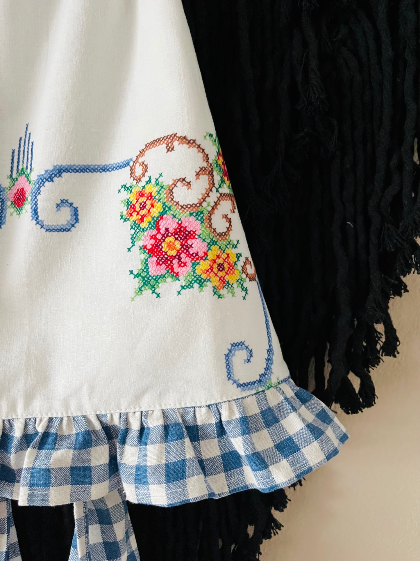 Cross stitch halter neck top with blue gingham back straps and frill