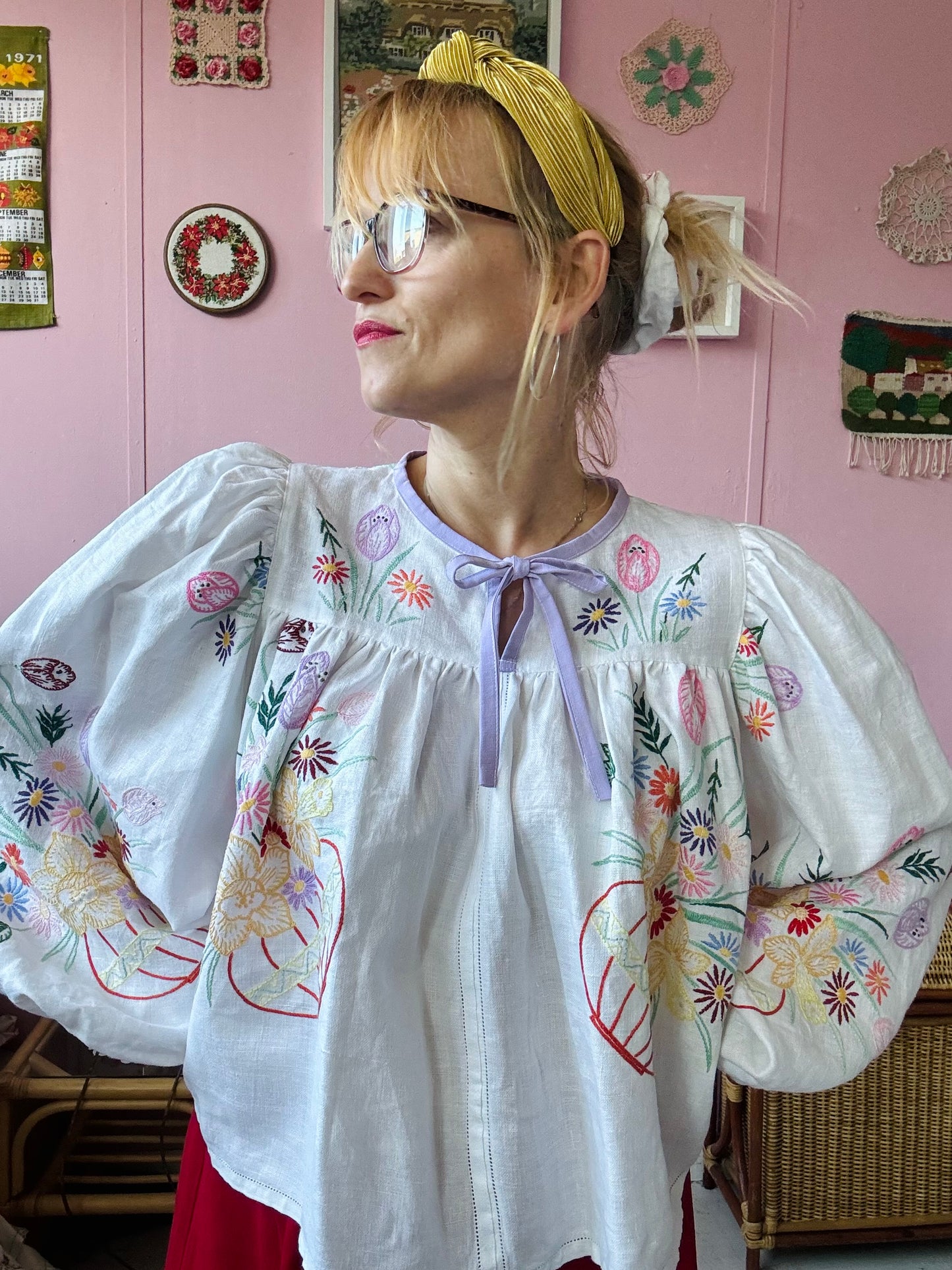 White linen blouse with baskets embroidery and lilac binding