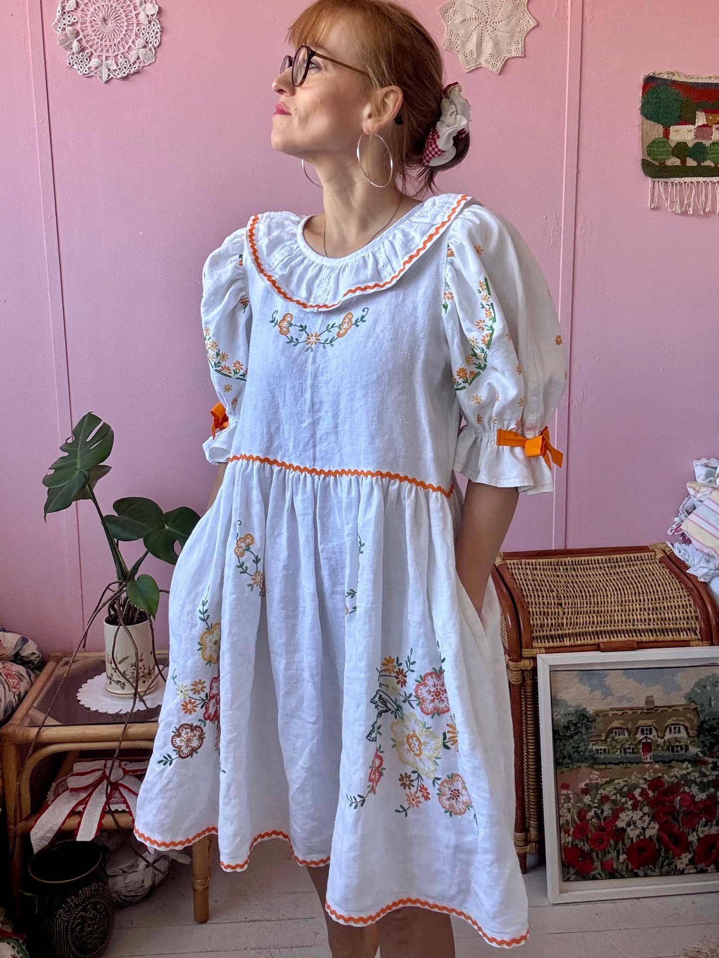 Linen dress with floral hand embroidery and ric rac