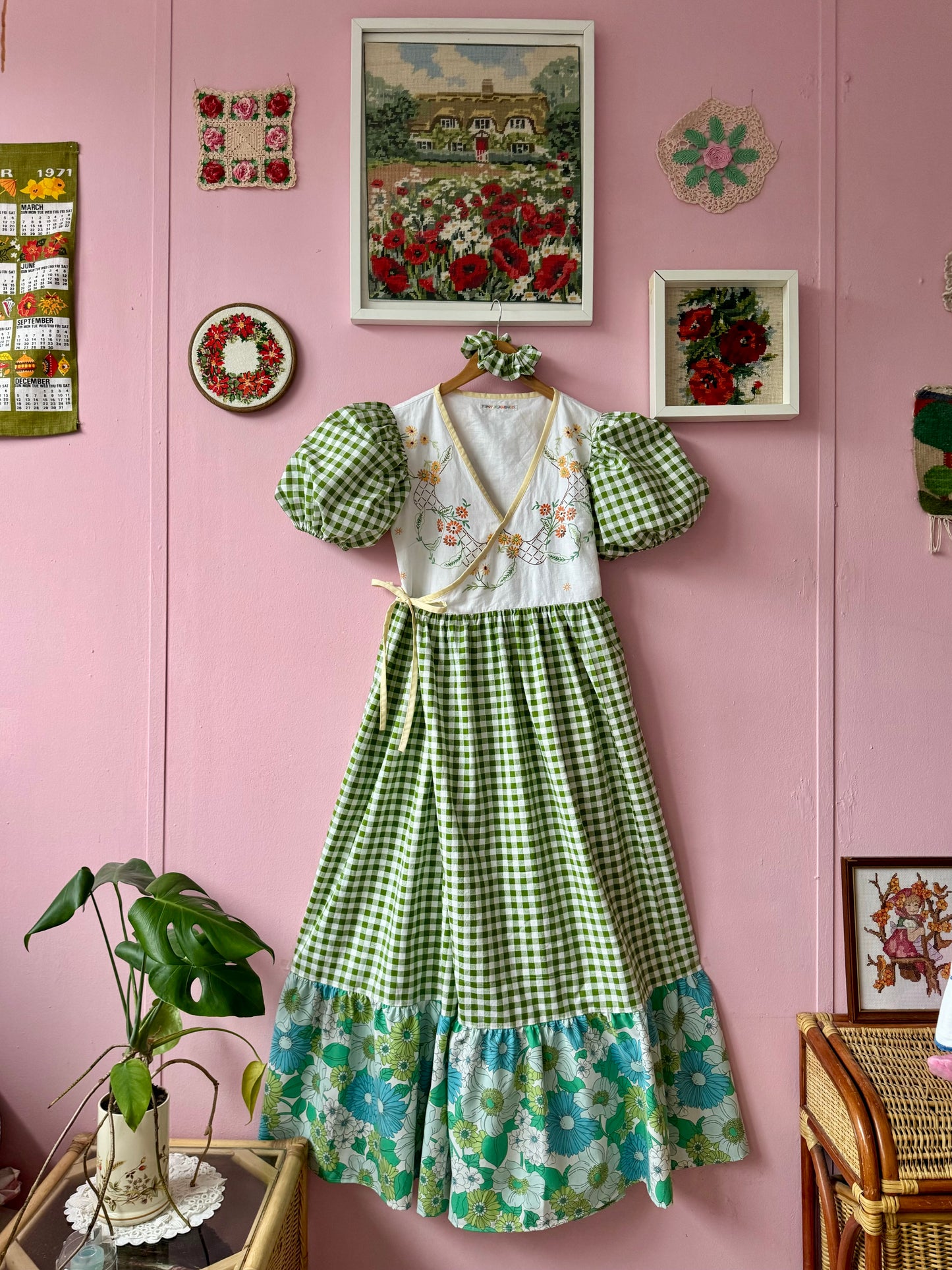 Wrap around dress with green gingham and embroidery