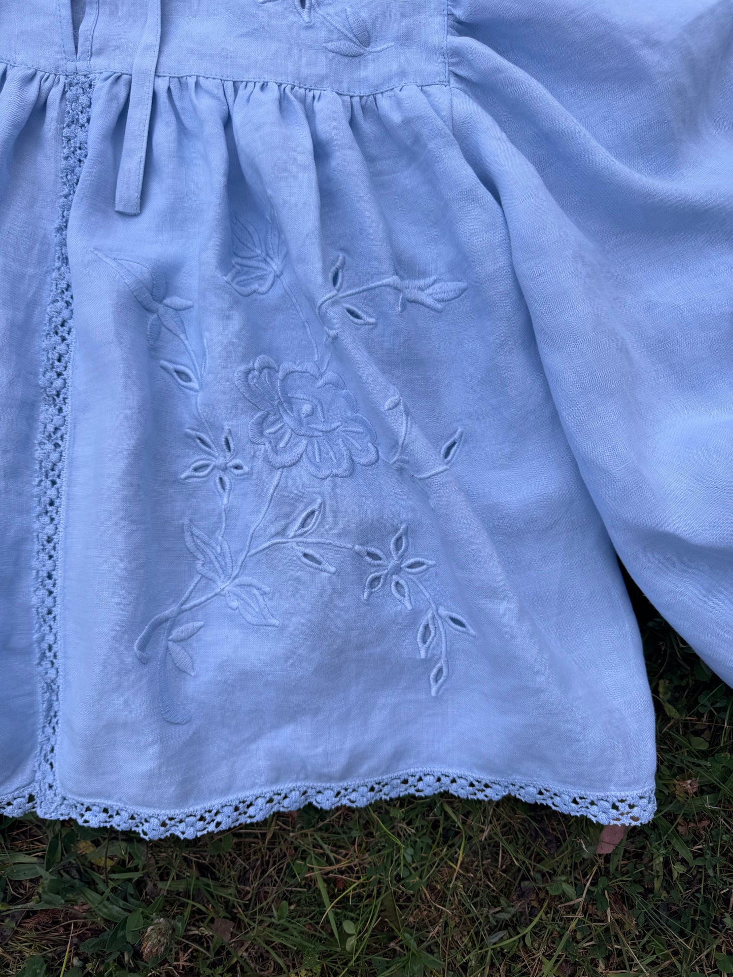 Light blue blouse with long sleeves