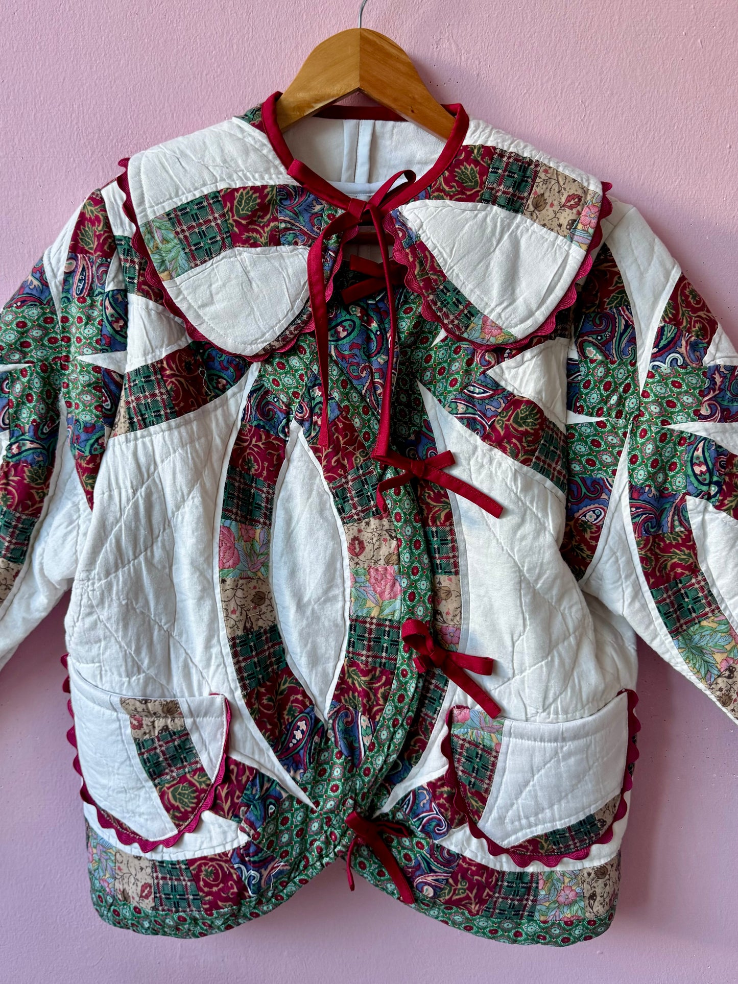 Patchwork jacket with burgundy ric rac and bows