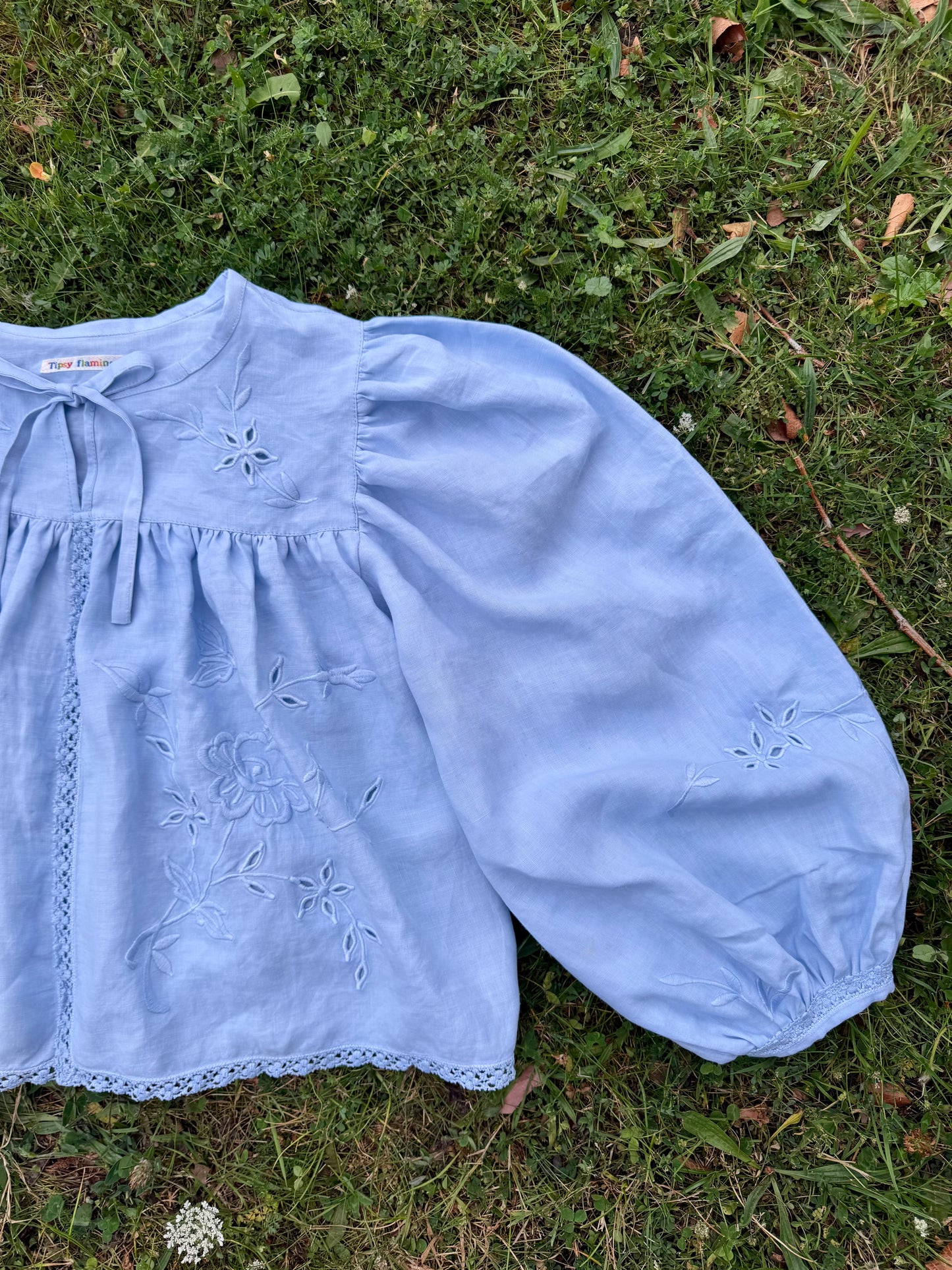 Light blue blouse with long sleeves