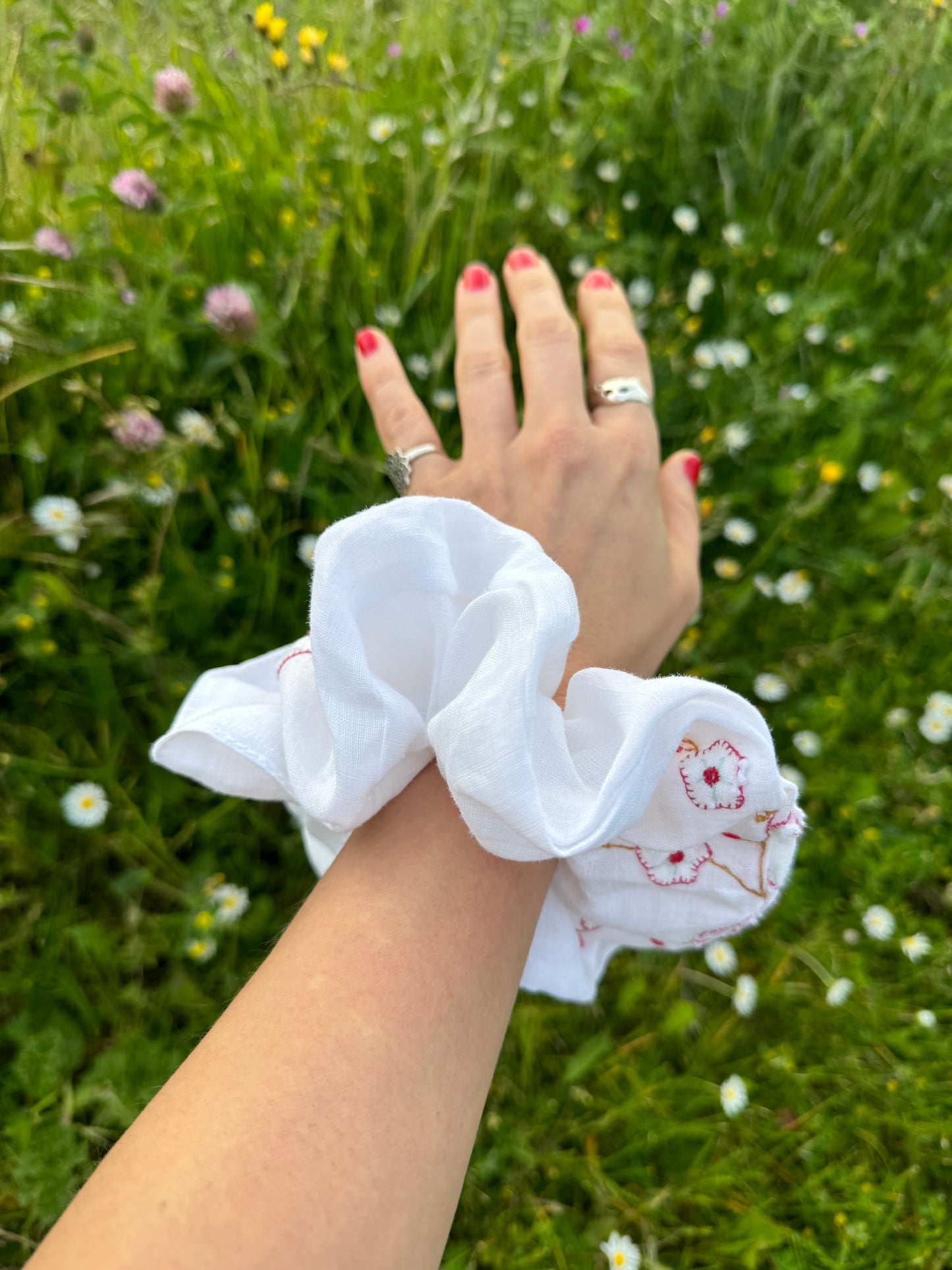 Light linen embroidery with appliqués