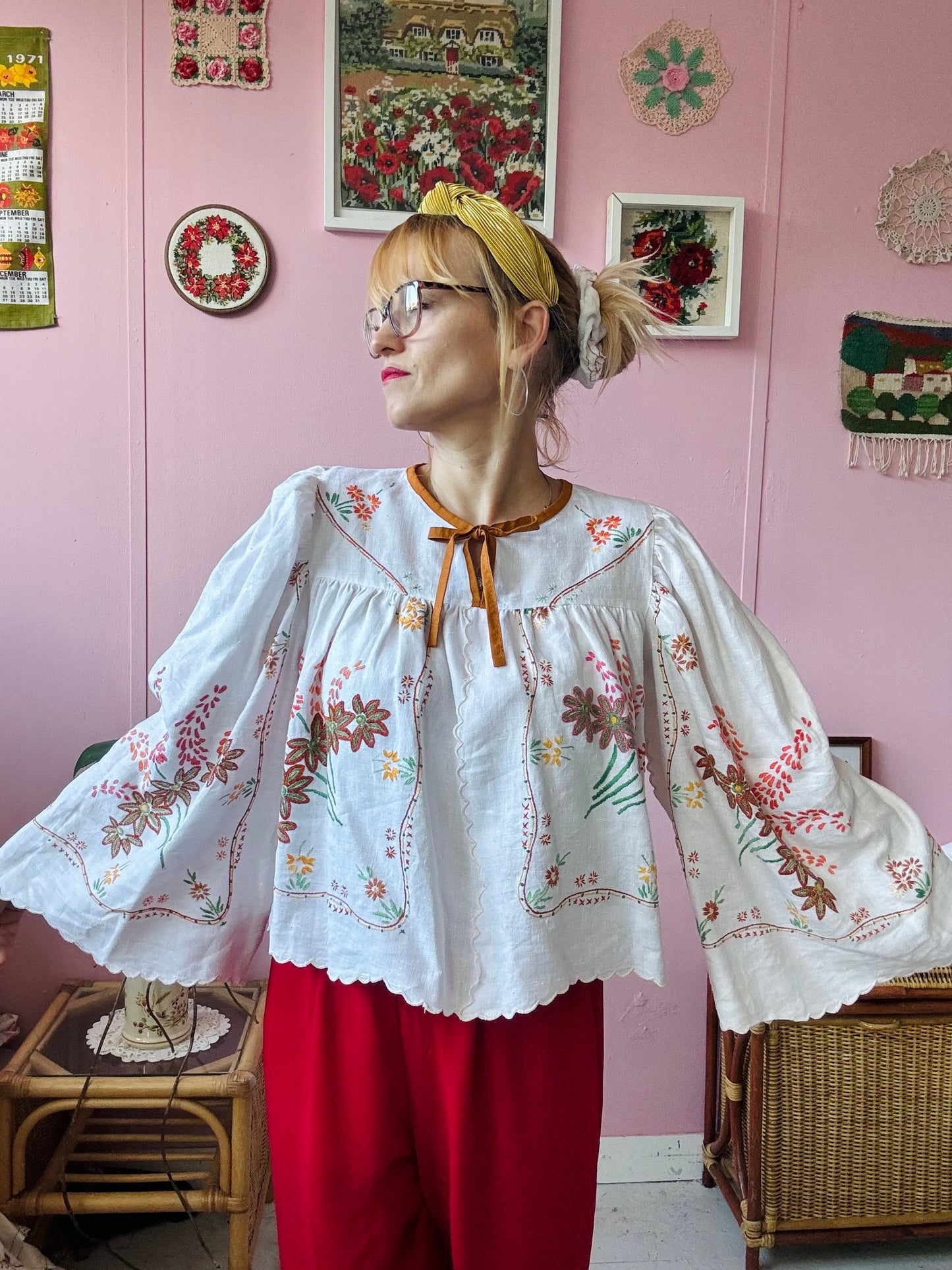 Linen blouse with floral embroidery and wide sleeves