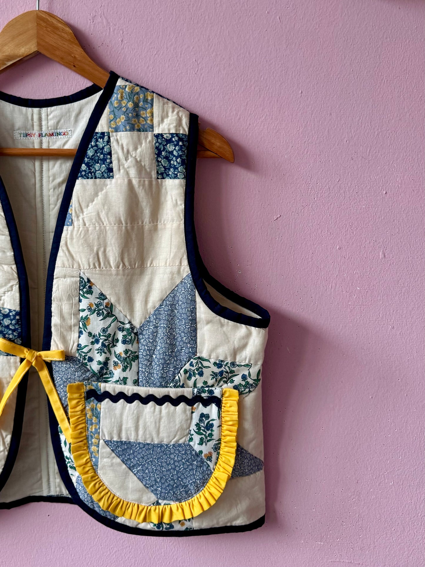 Blue/white vest with yellow trim