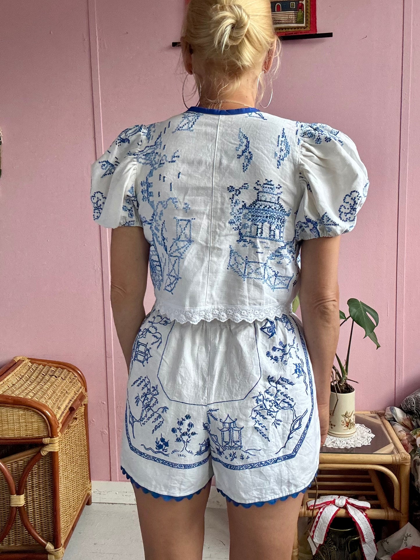 White shorts with blue hand embroidery
