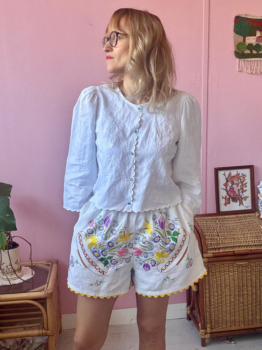 Shorts with floral embroidery and yellow ric rac