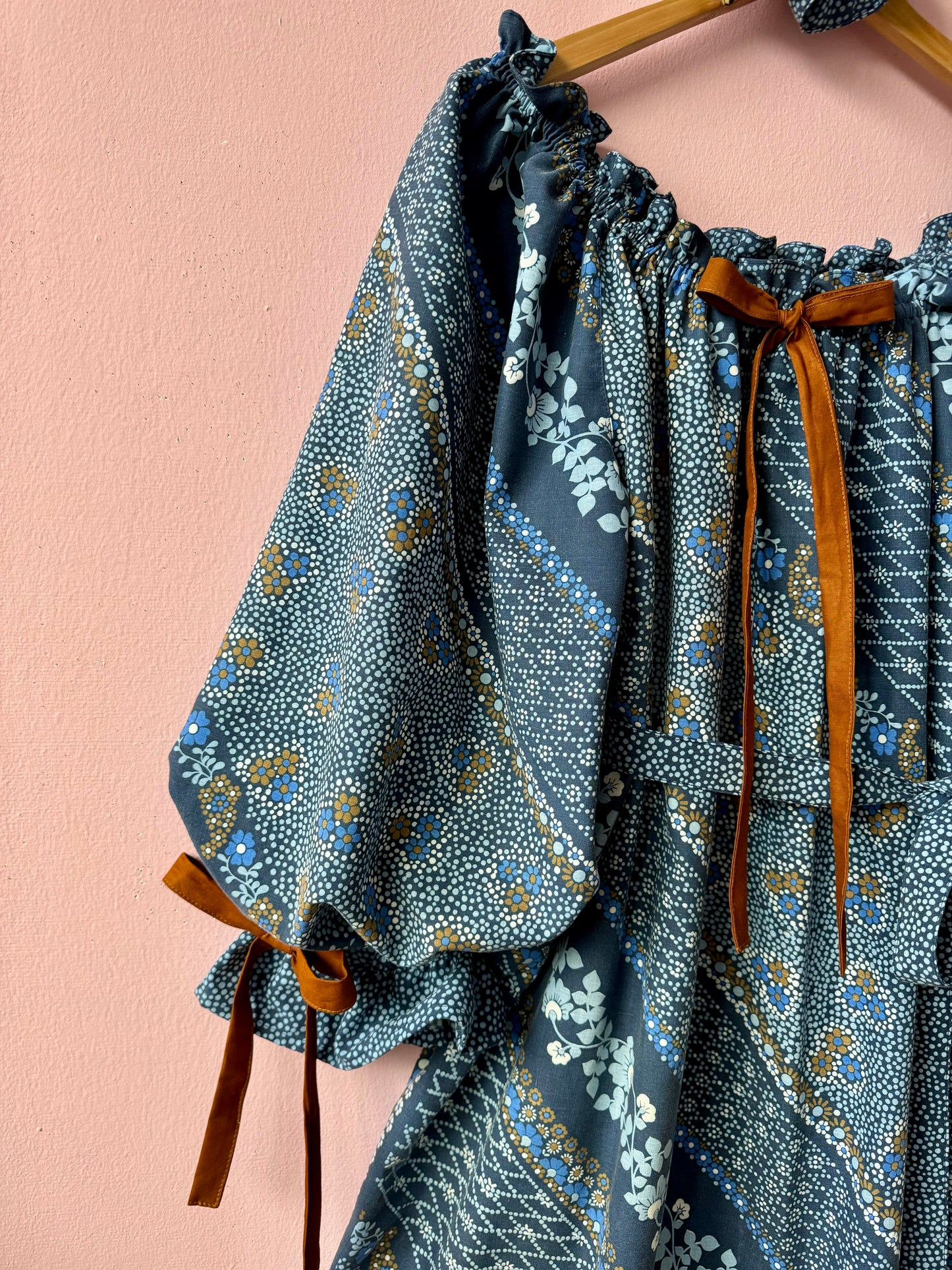 Blue and brown dress with long sleeves