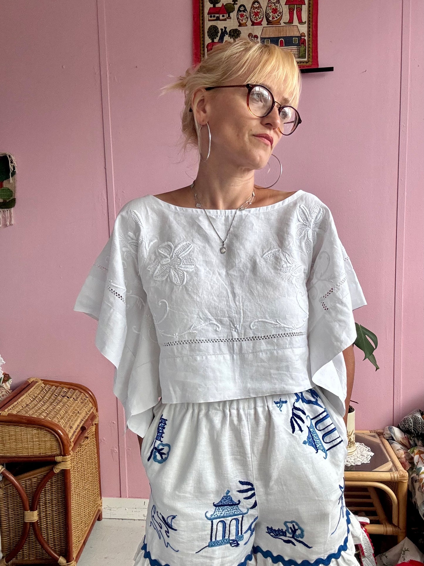 All white basic top with floral hand embroidery