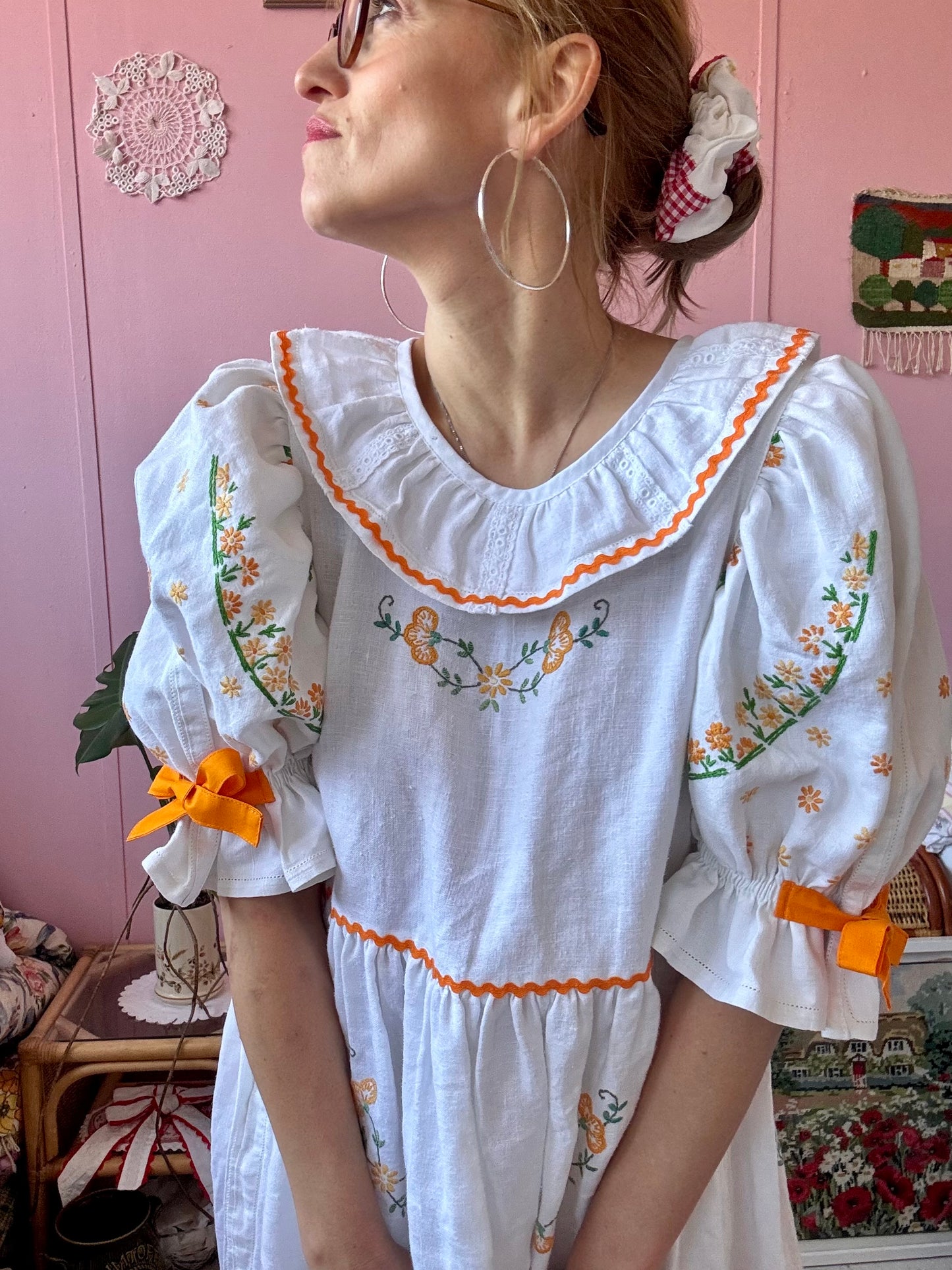 Linen dress with floral hand embroidery and ric rac