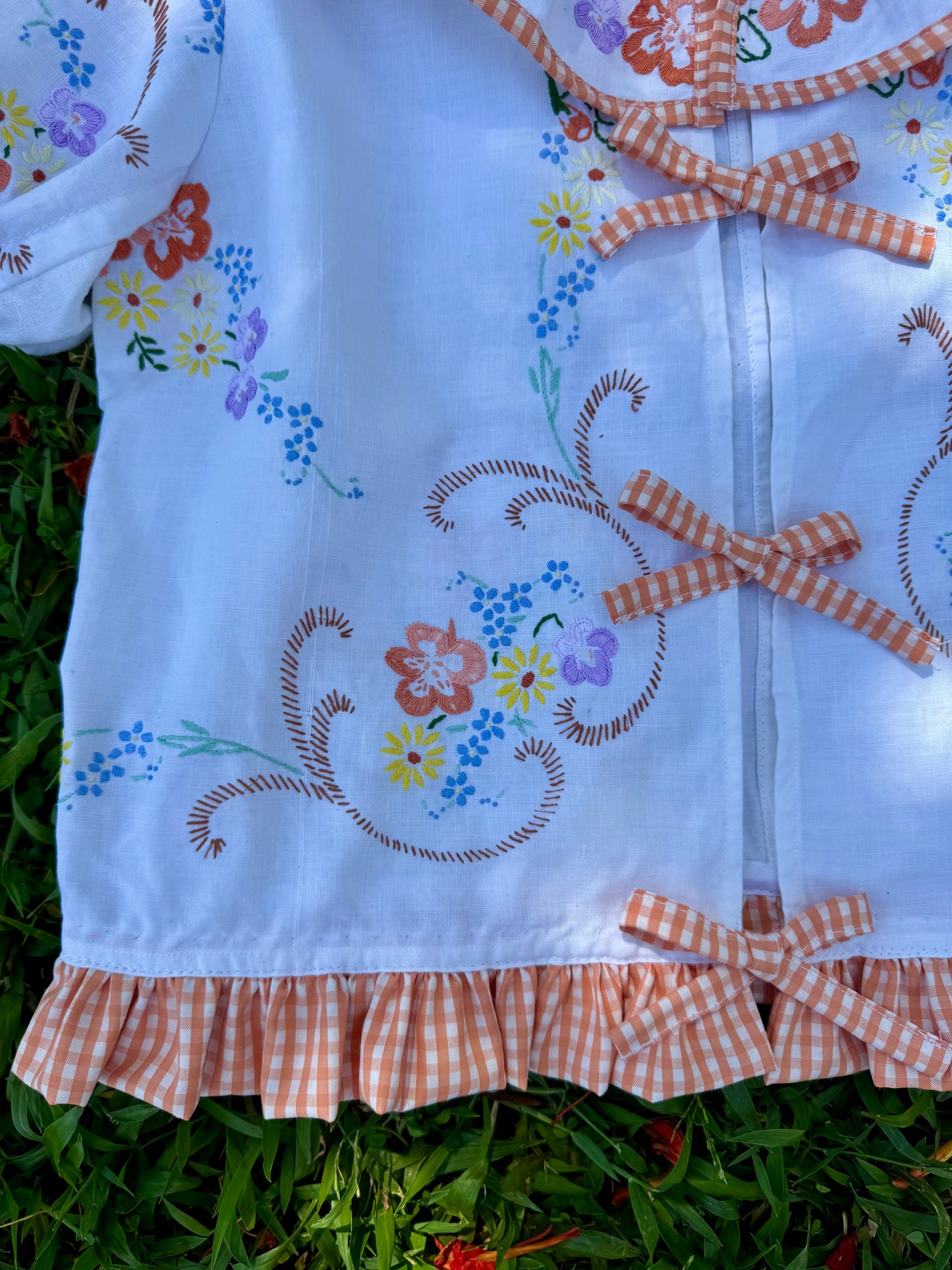 Floral blouse with orange gingham