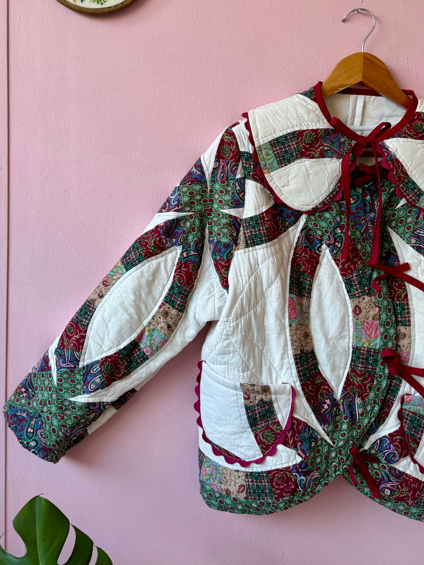 Patchwork jacket with burgundy ric rac and bows