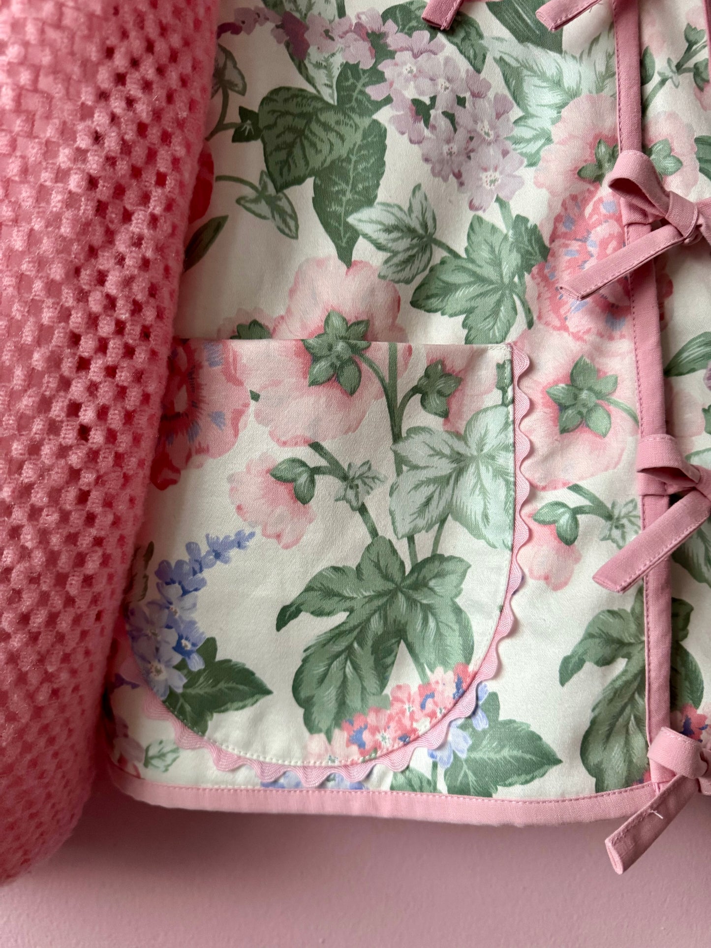 Floral jacket with pink sleeves