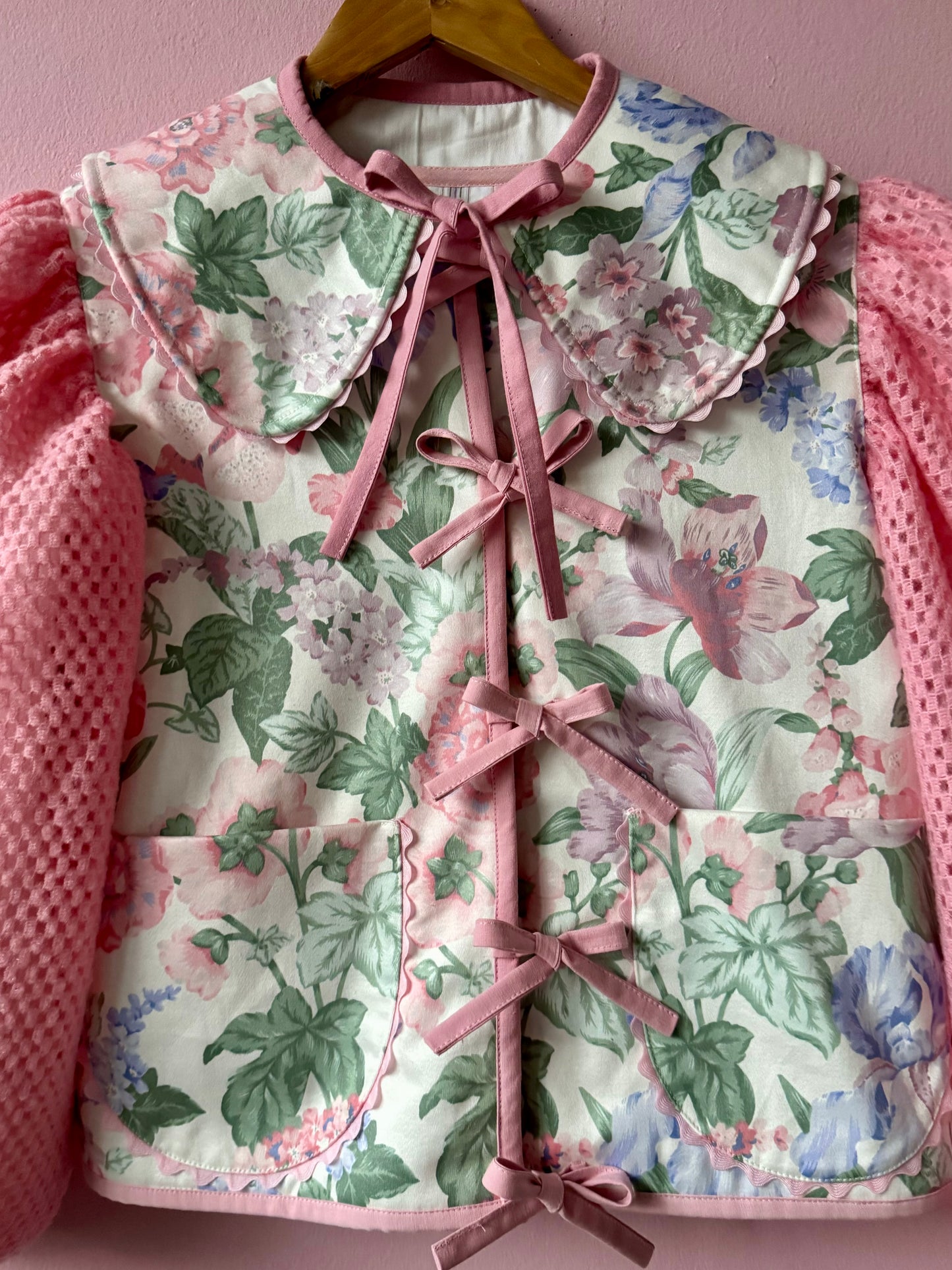 Floral jacket with pink sleeves