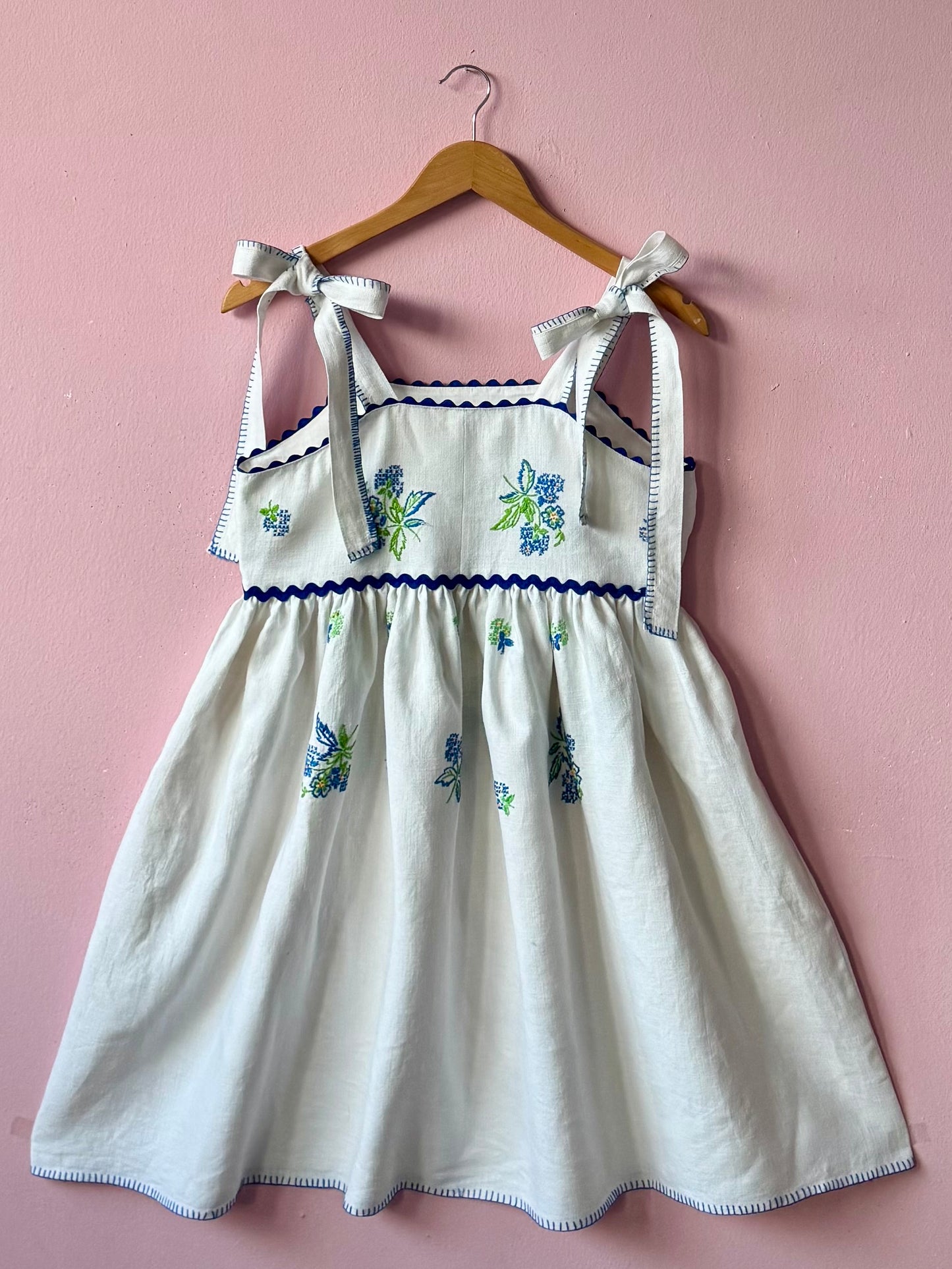Linen  mini dress with blue floral embroidery