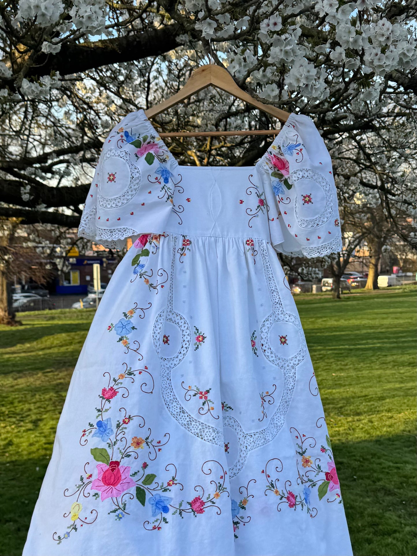 White maxi dress with appliqué,embroidery and lace panels