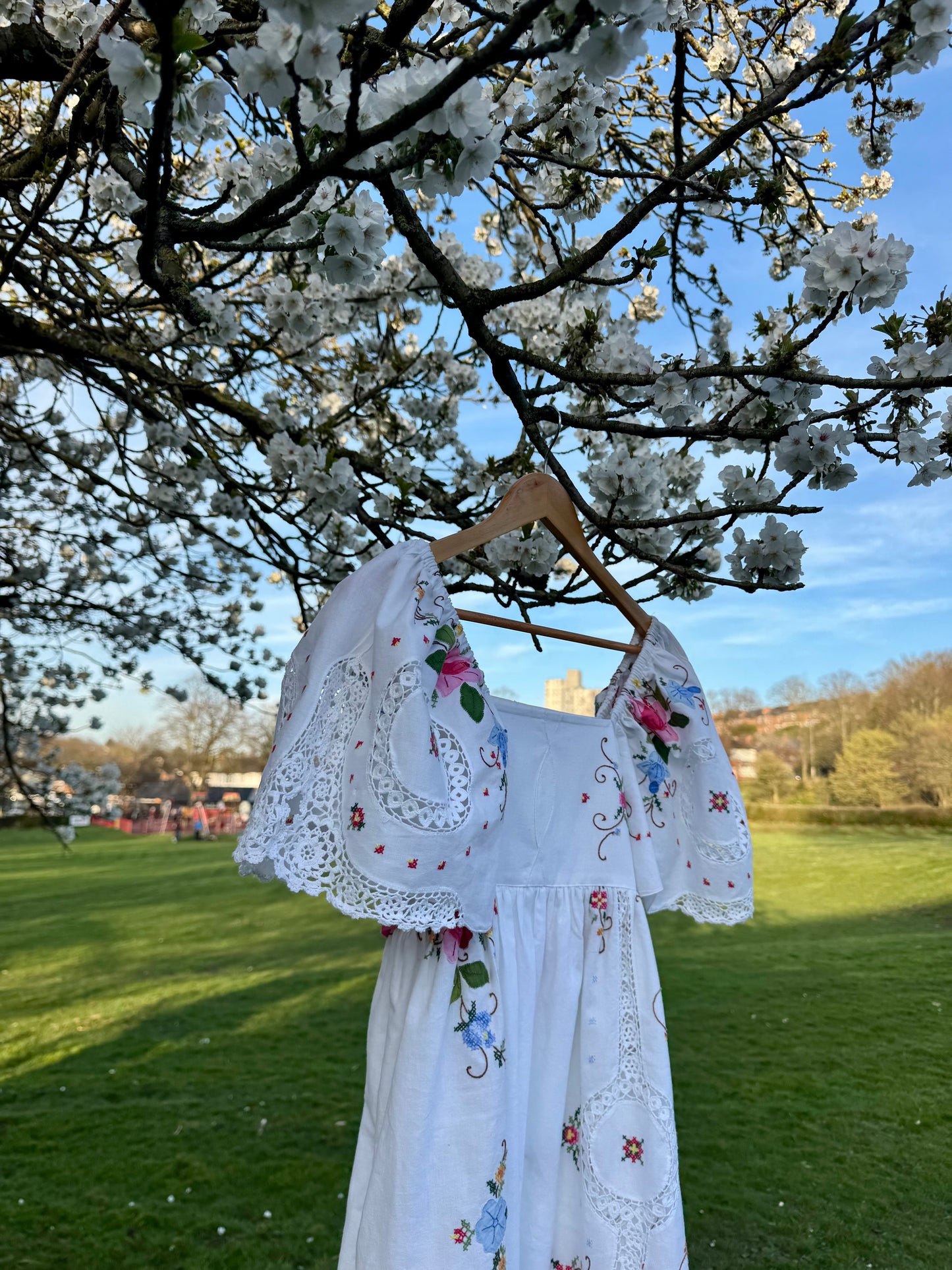 White maxi dress with appliqué,embroidery and lace panels