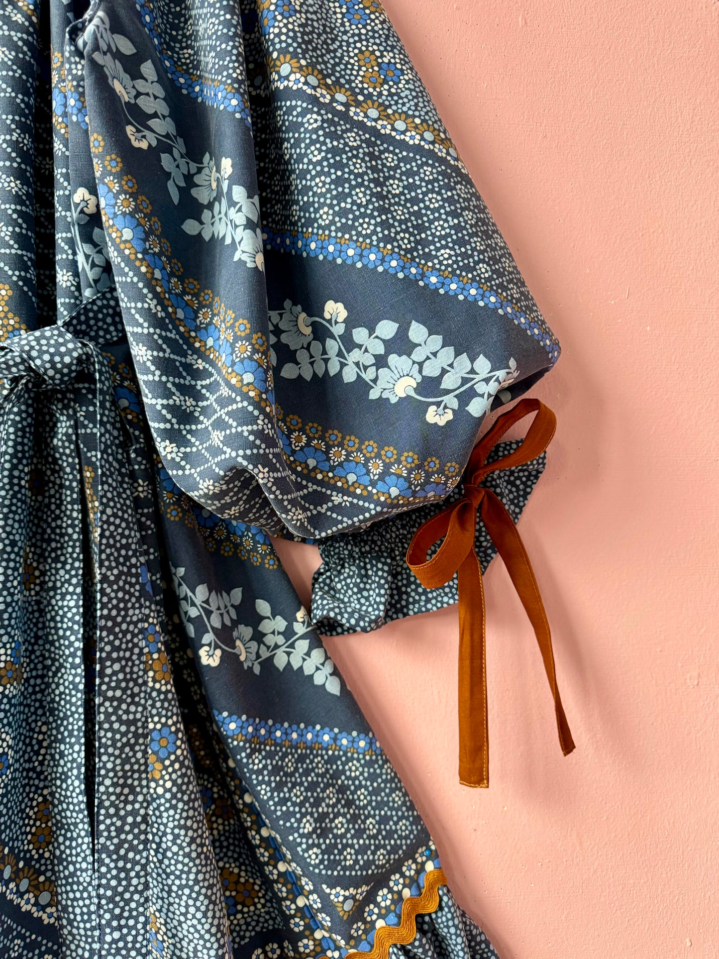 Blue and brown dress with long sleeves