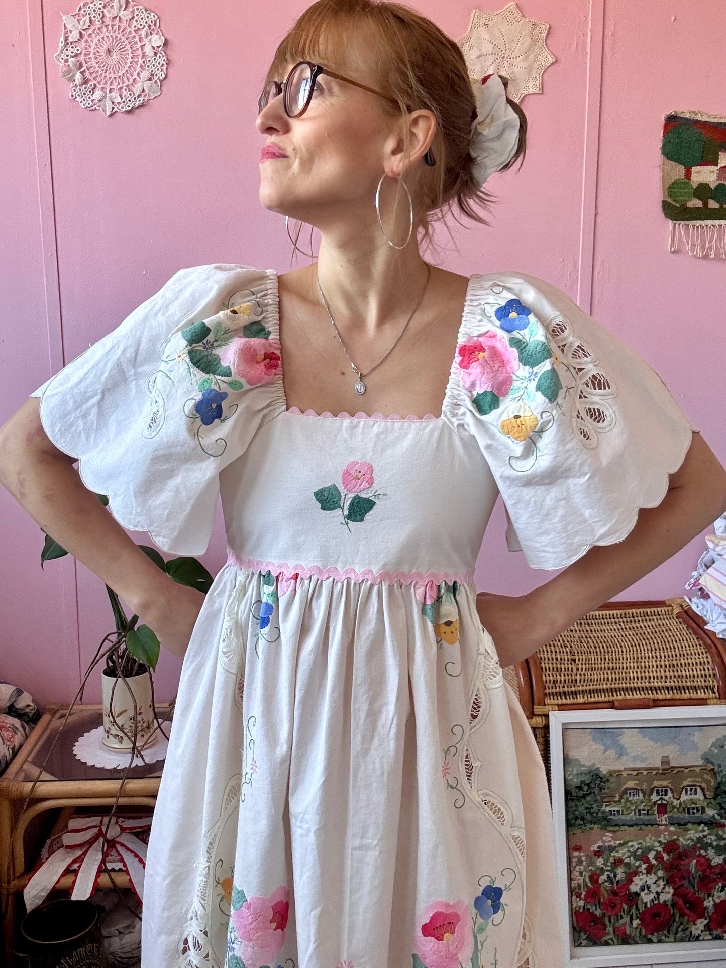 Cream maxi dress with floral appliqués