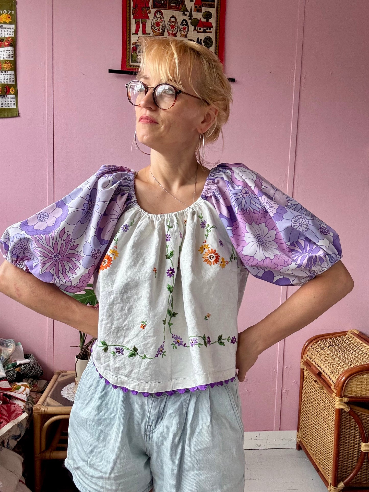 Floral blouse with purple floral sleeves