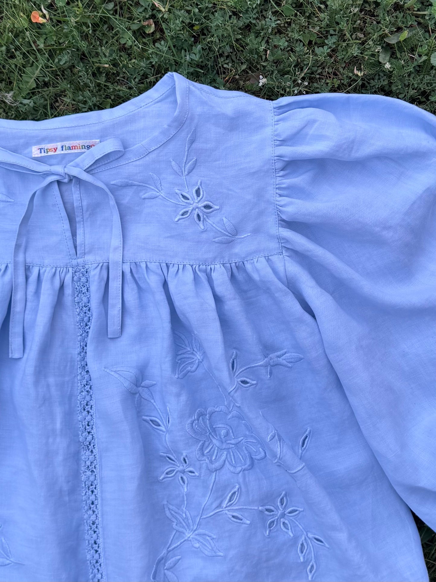 Light blue blouse with long sleeves