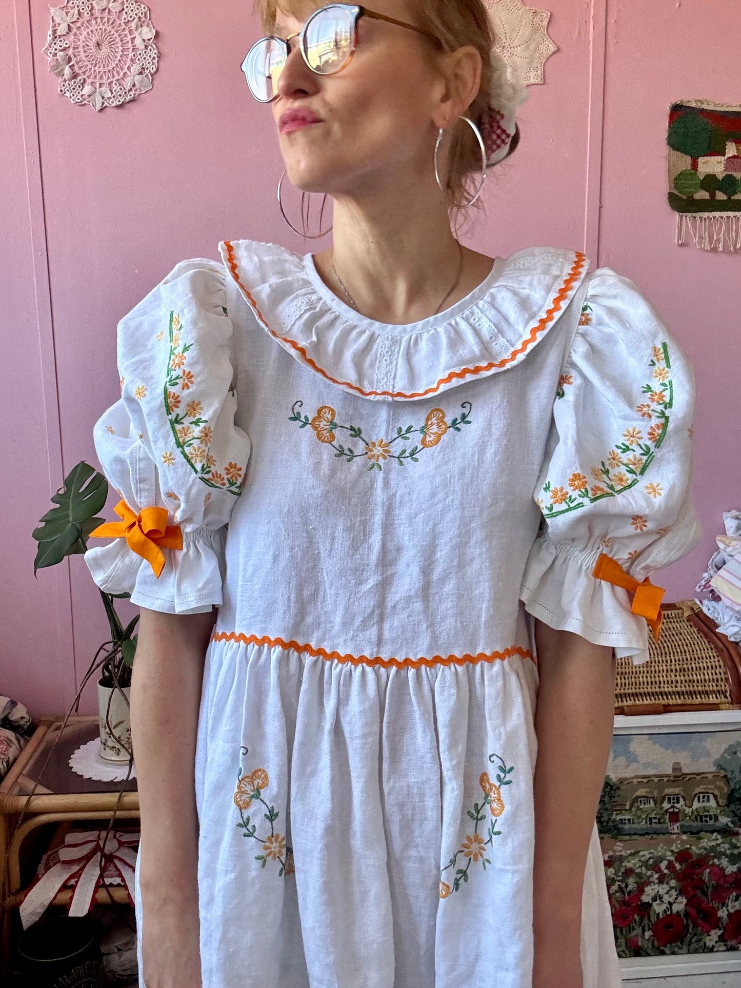 Linen dress with floral hand embroidery and ric rac