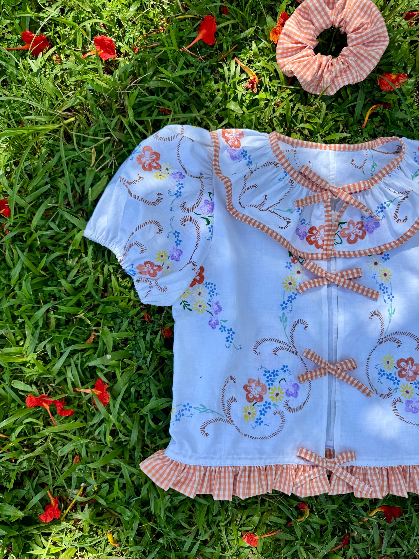 Floral blouse with orange gingham