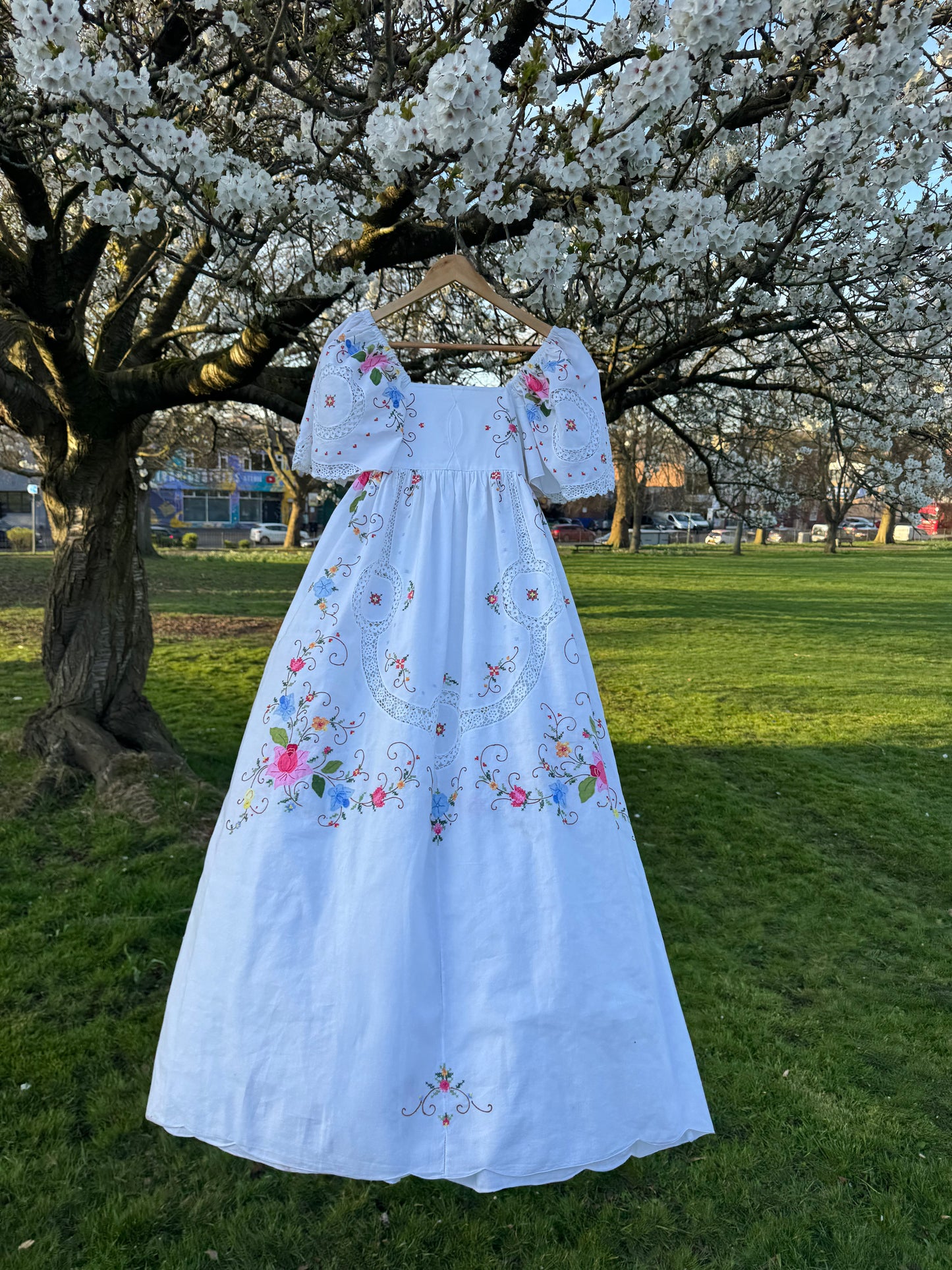 White maxi dress with appliqué,embroidery and lace panels
