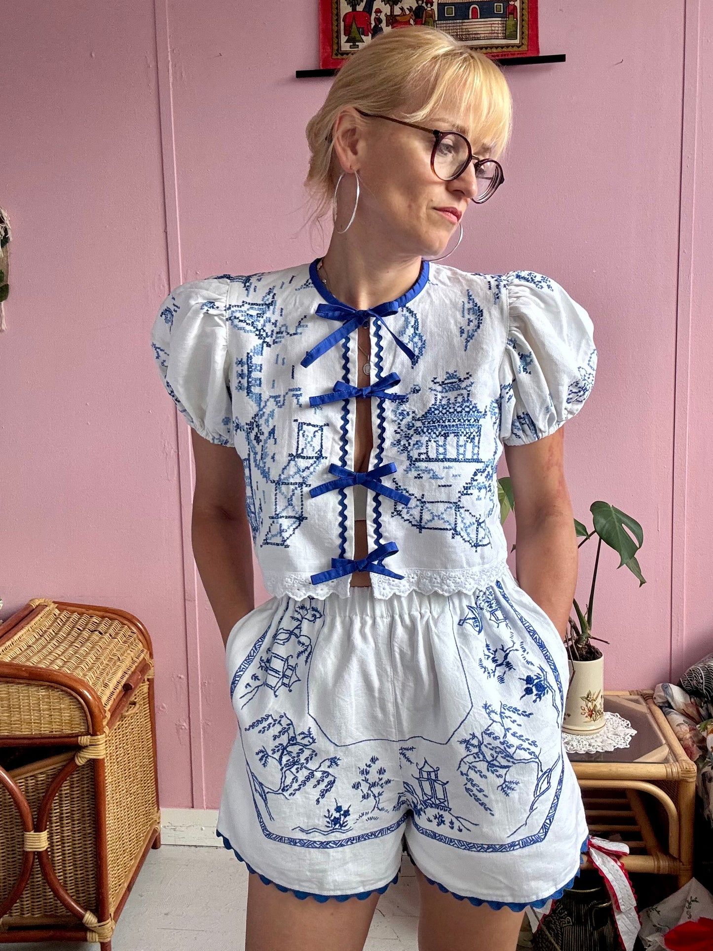 White shorts with blue hand embroidery