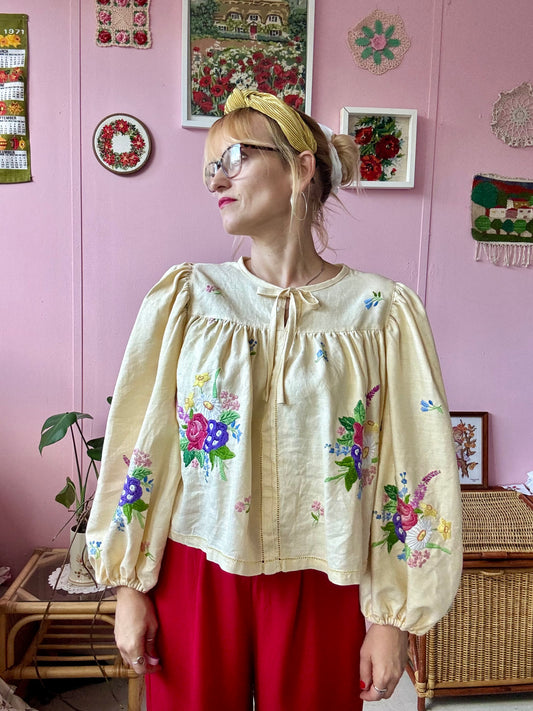 Yellow blouse with floral embroidery