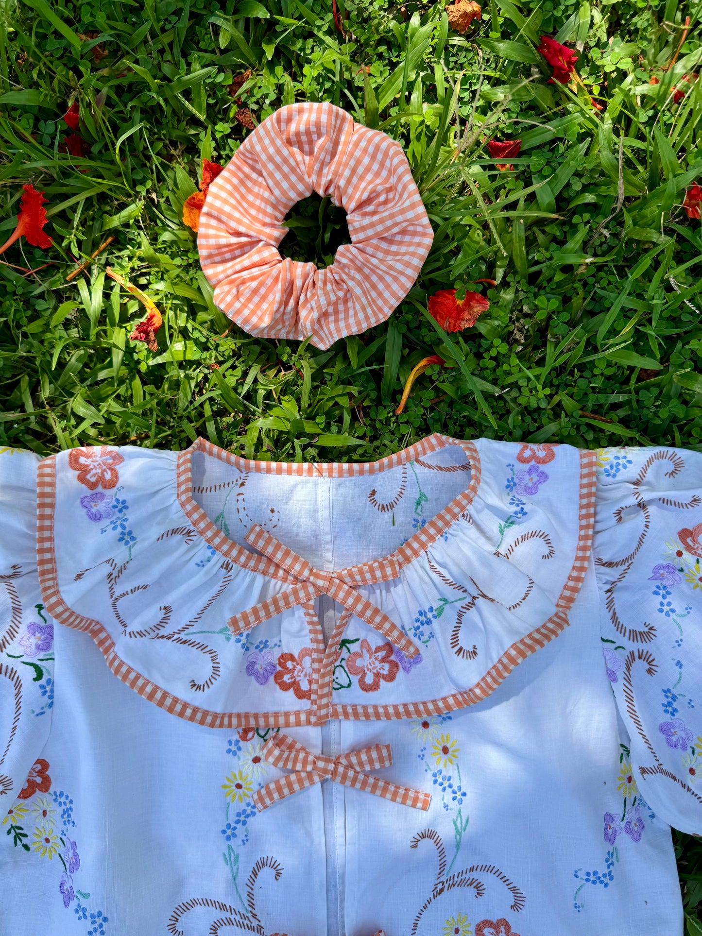 Floral blouse with orange gingham