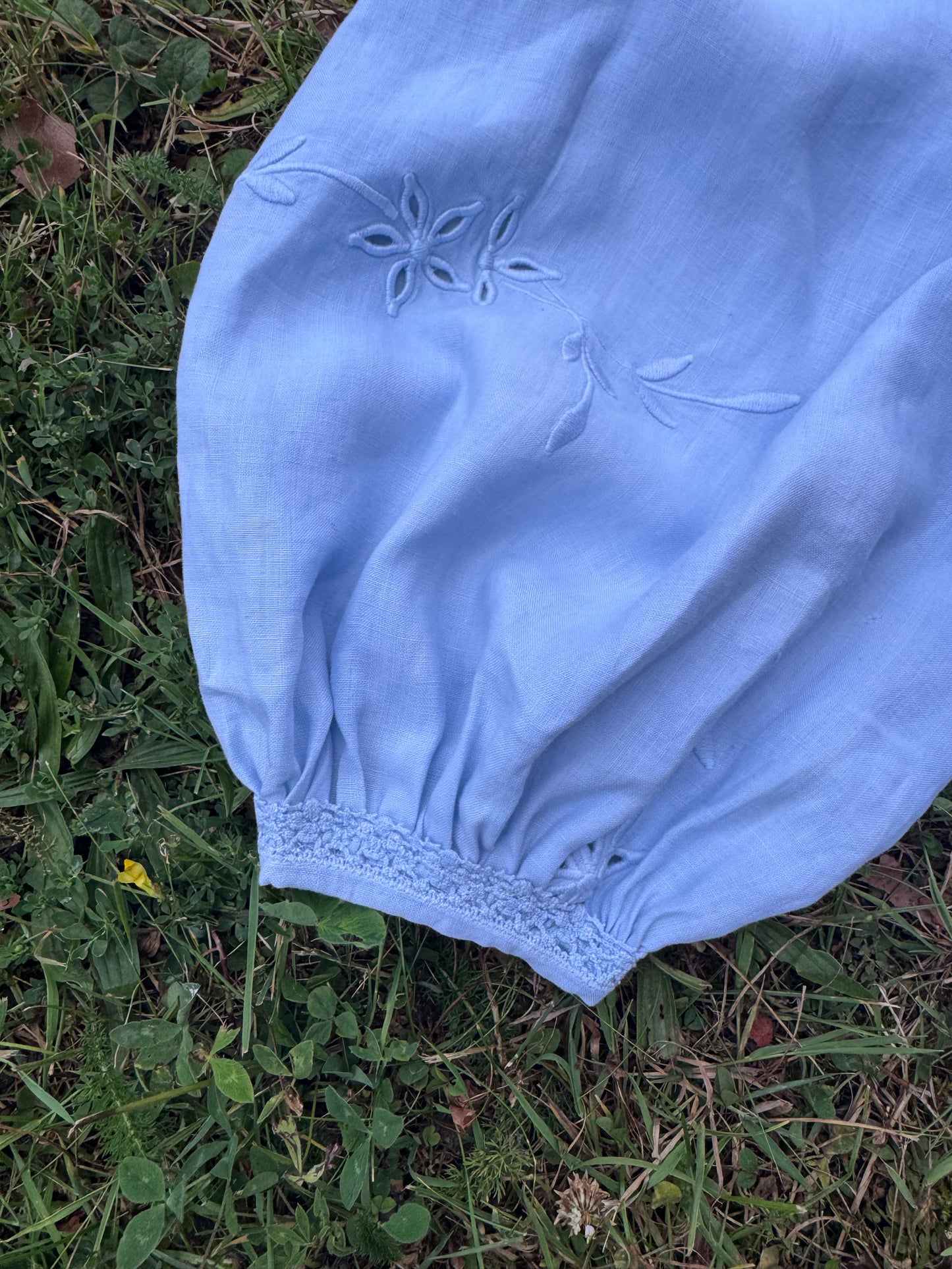 Light blue blouse with long sleeves