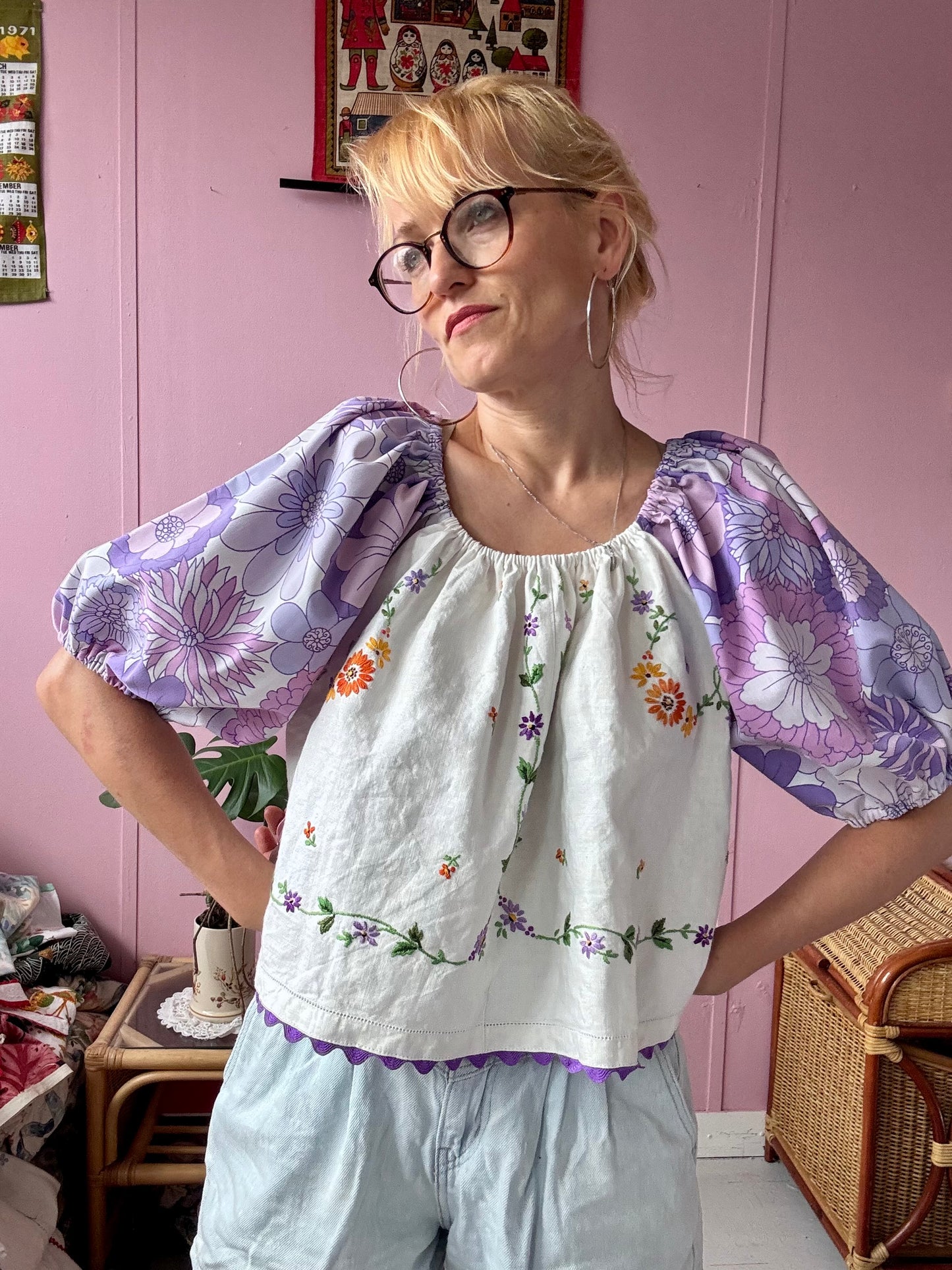 Floral blouse with purple floral sleeves
