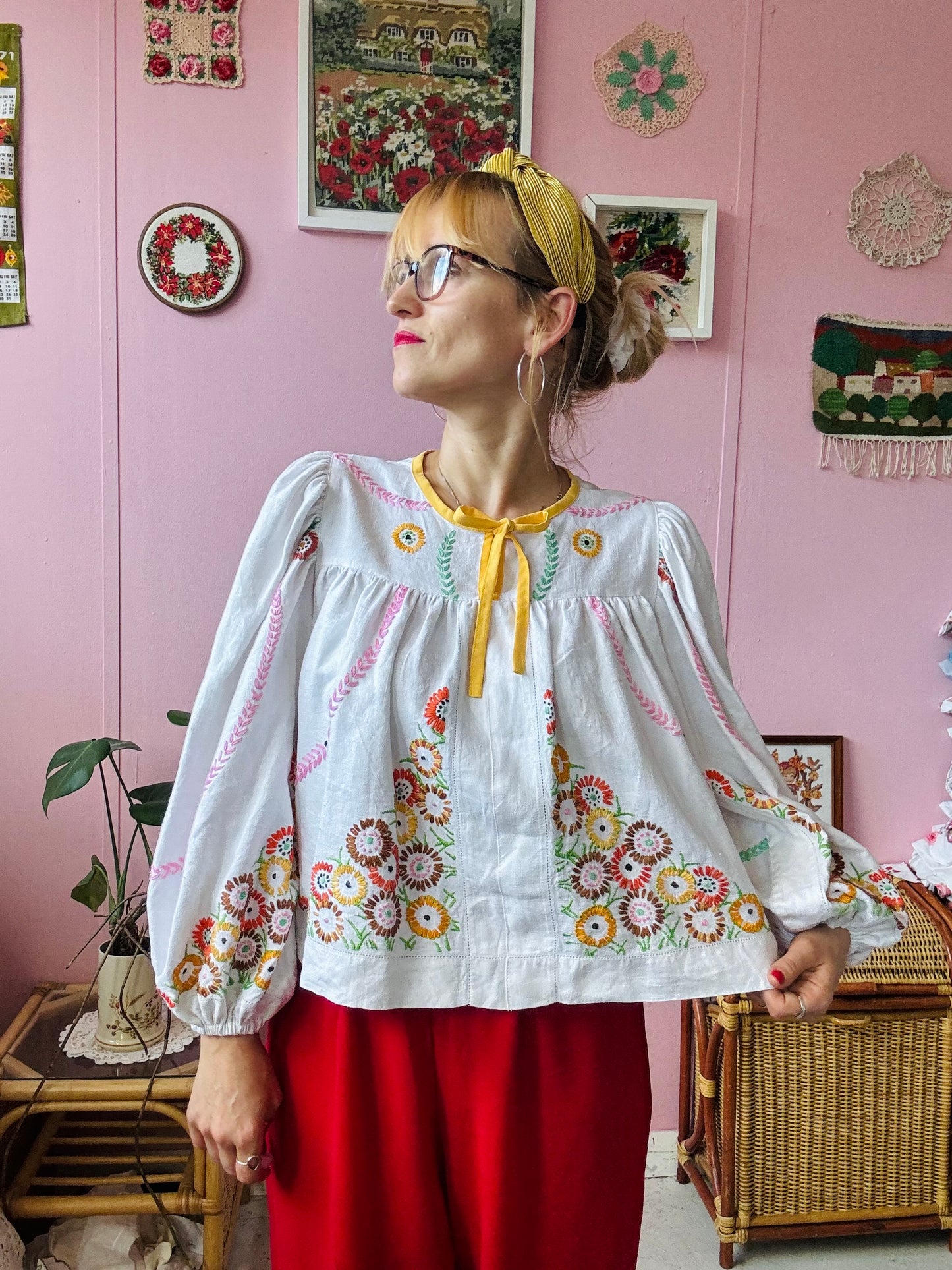 Linen blouse with floral embroidery and yellow binding