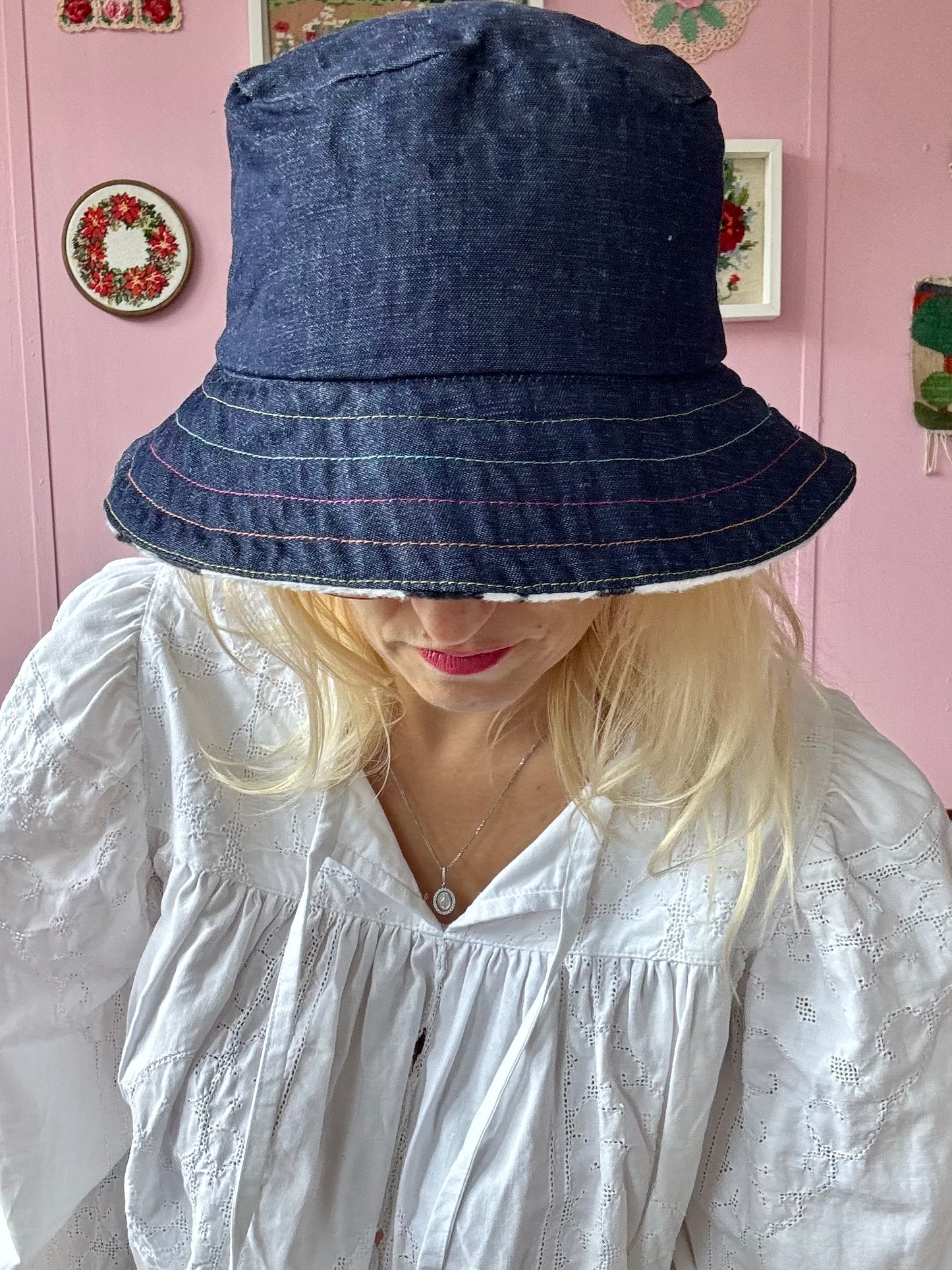 Reversible faux cow fur and denim with rainbow stitching bucket hat