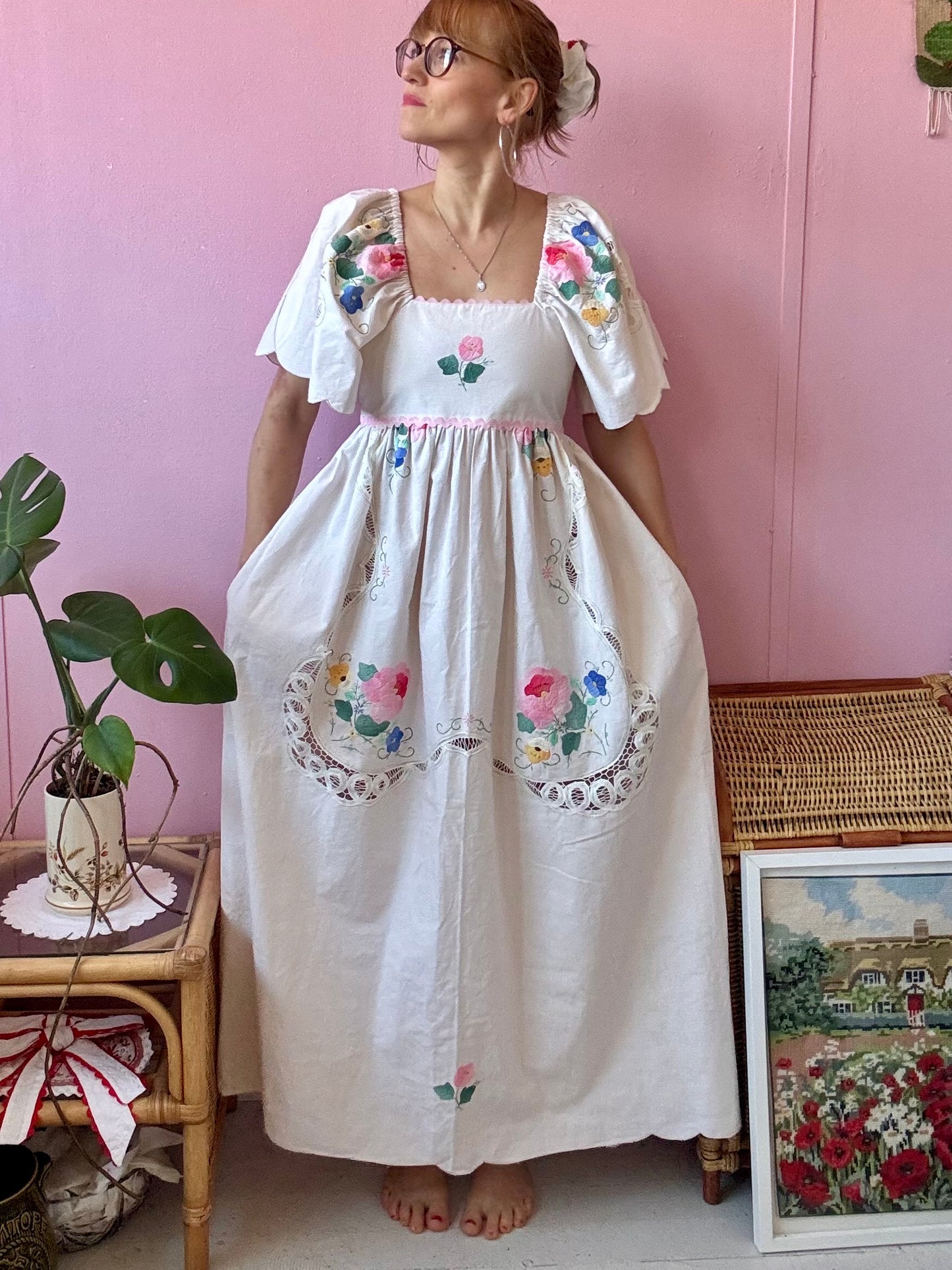 Cream maxi dress with floral appliqués