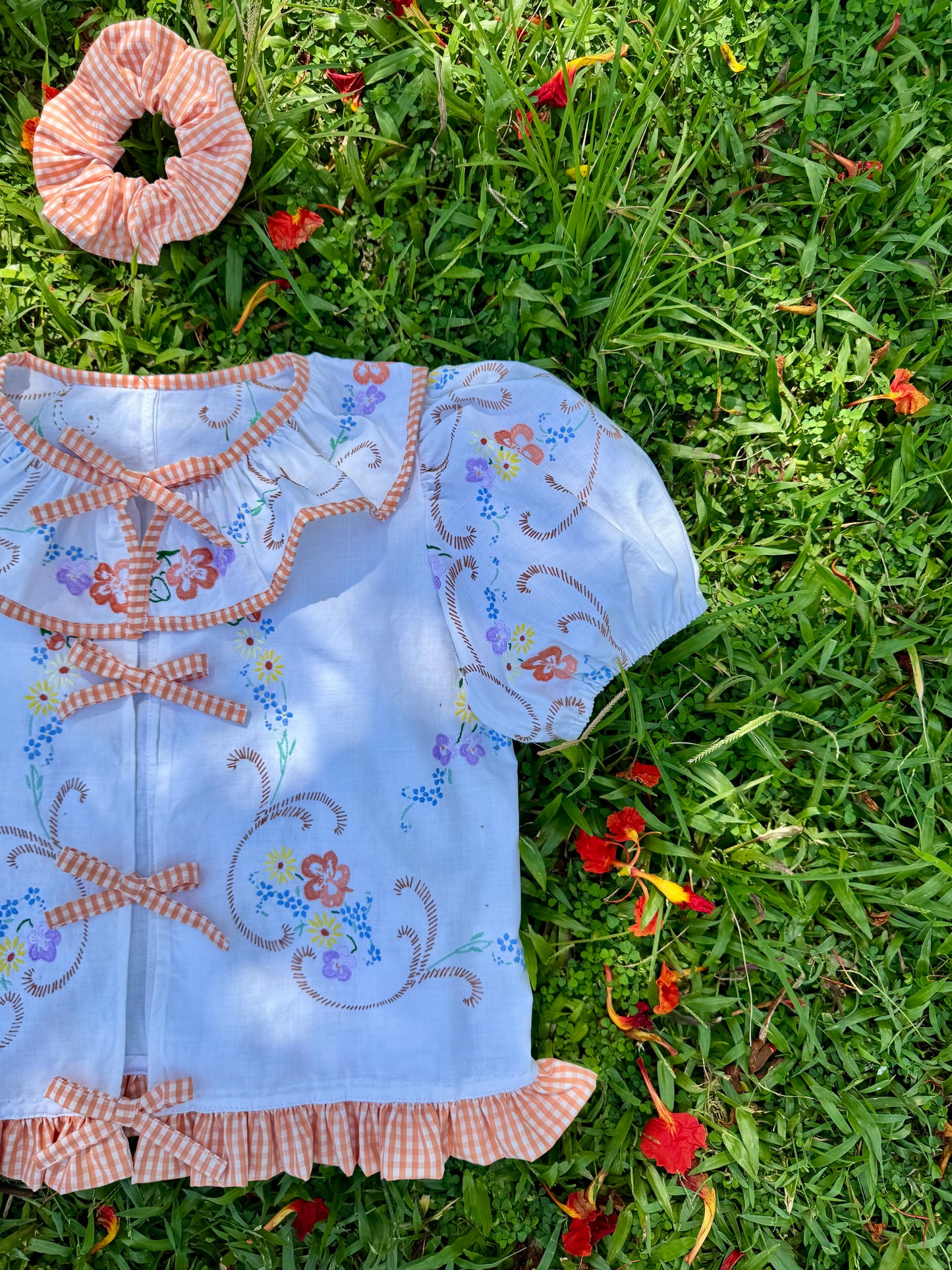 Floral blouse with orange gingham