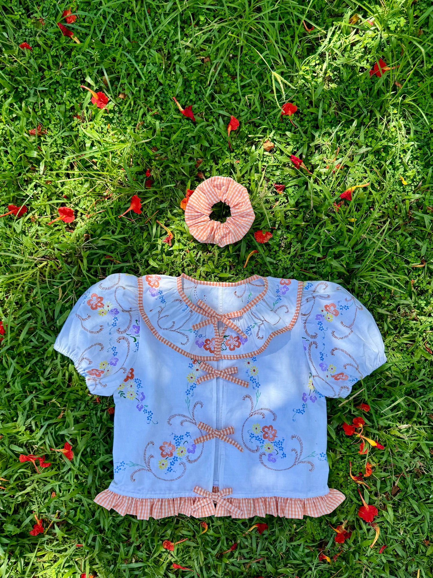 Floral blouse with orange gingham