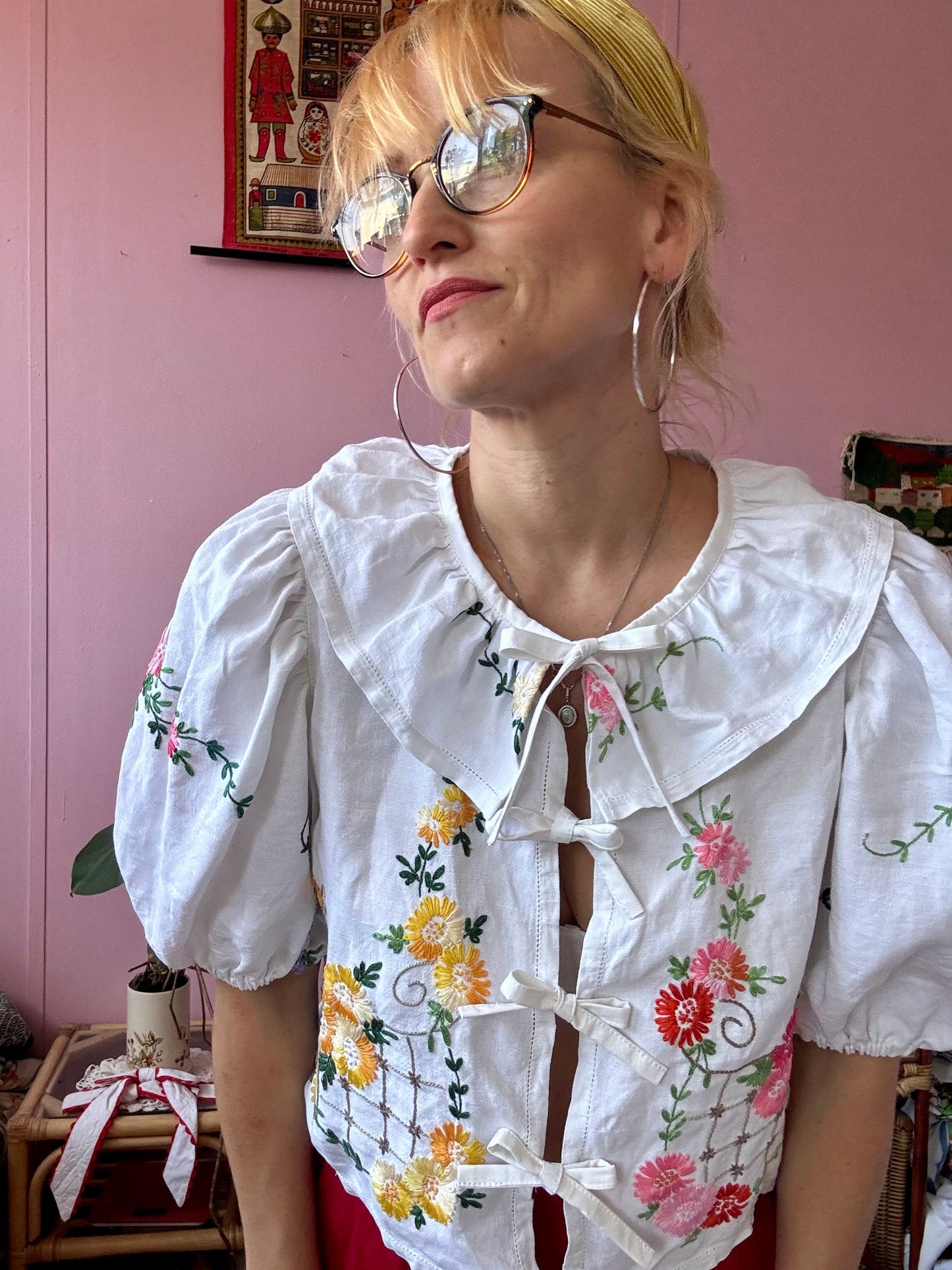 White floral blouse with neckline frill