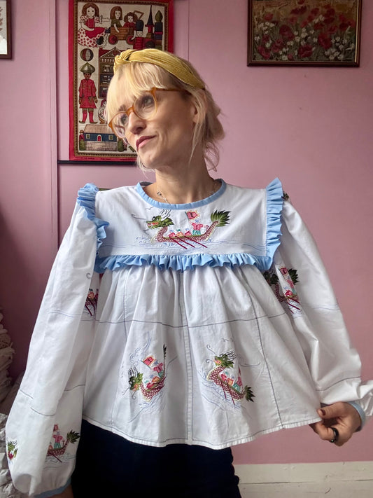 Dragon embroidery blouse with blue frill