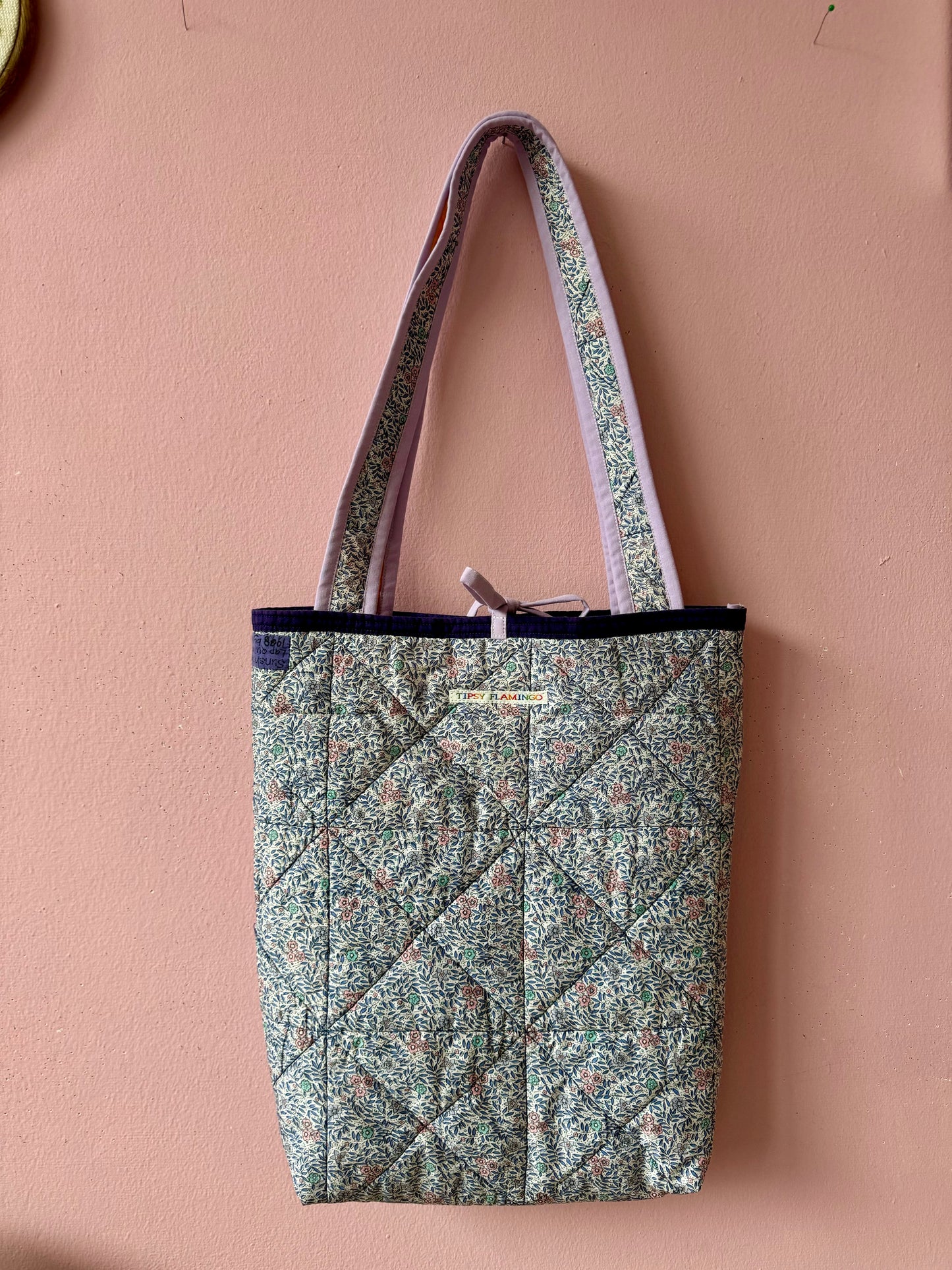 Patchwork and floral tote bag with pockets