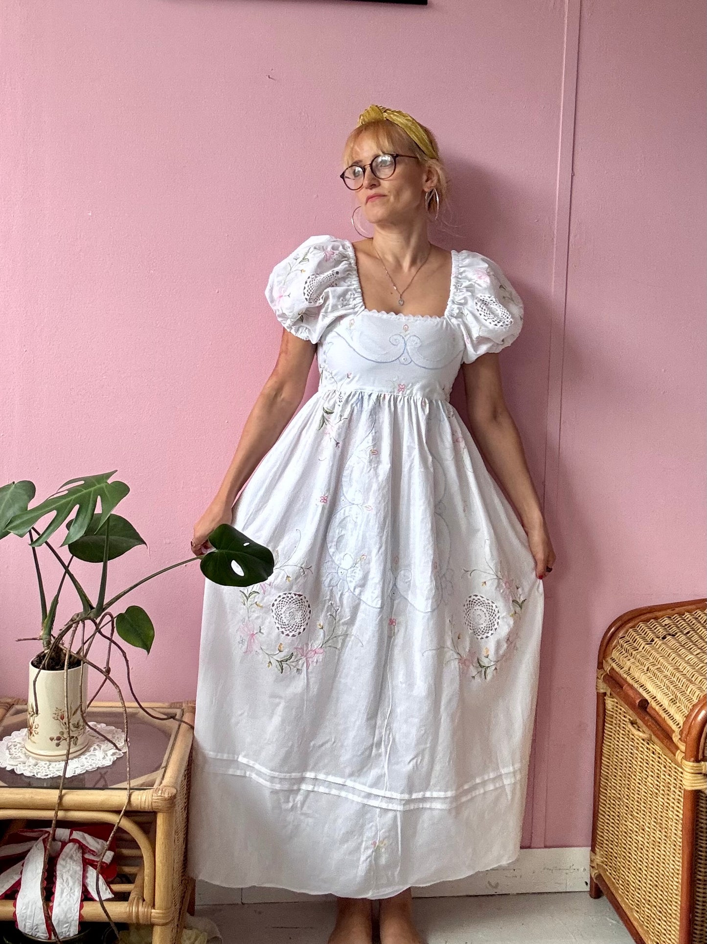 White maxi dress with floral embroidery and puffy sleeves