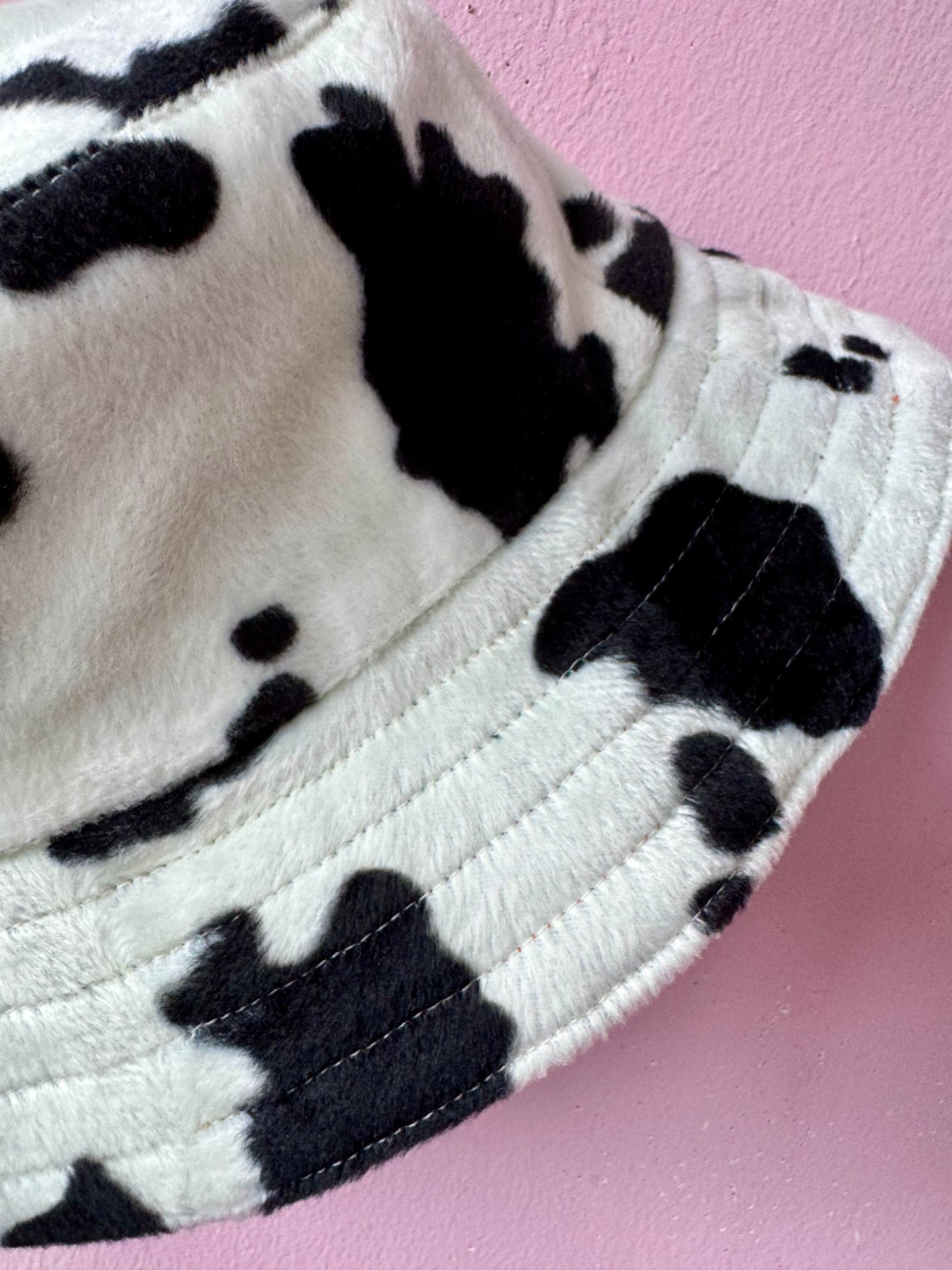 Reversible faux cow fur and denim with rainbow stitching bucket hat