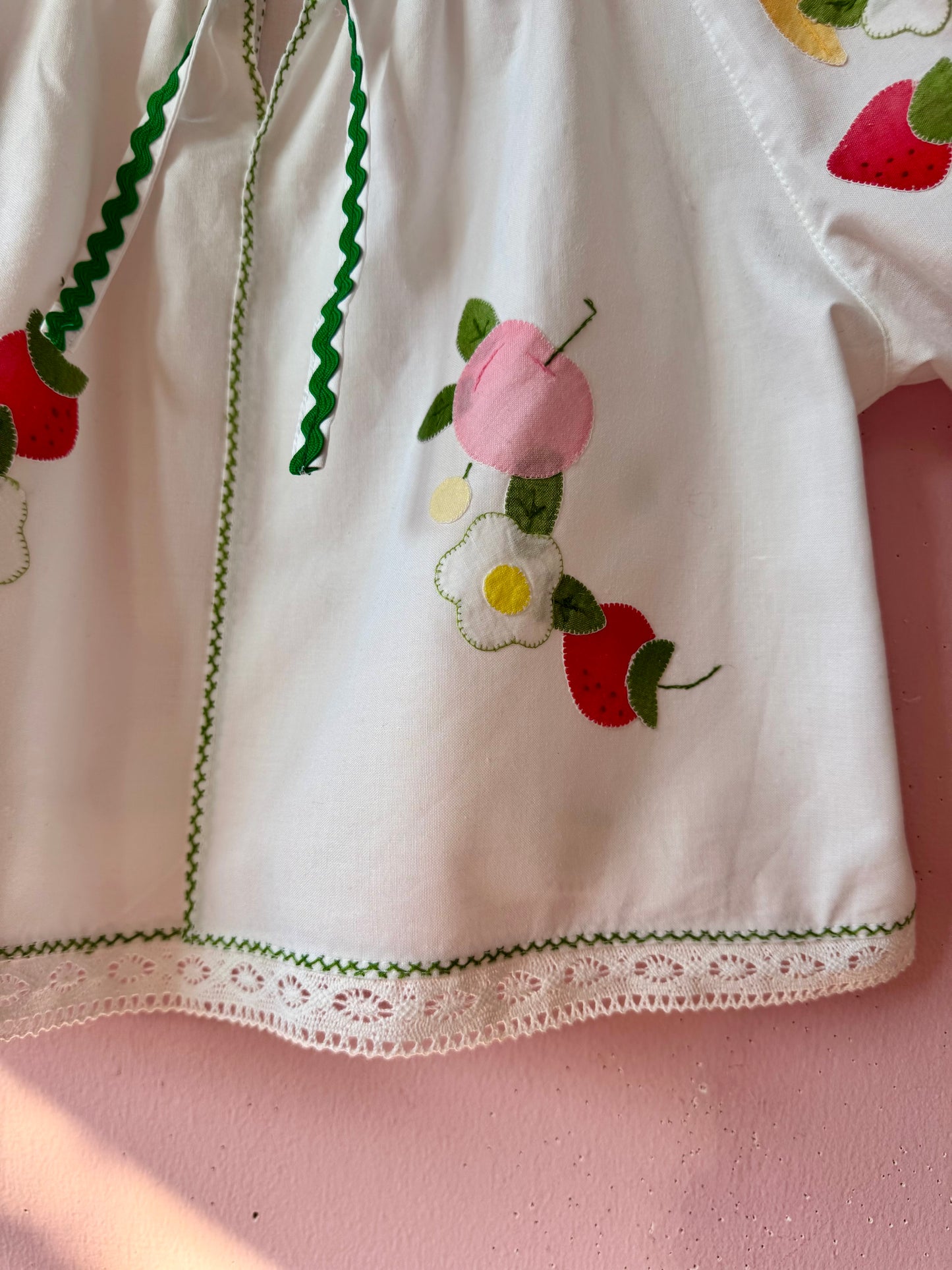 Fruity blouse with green ric rac