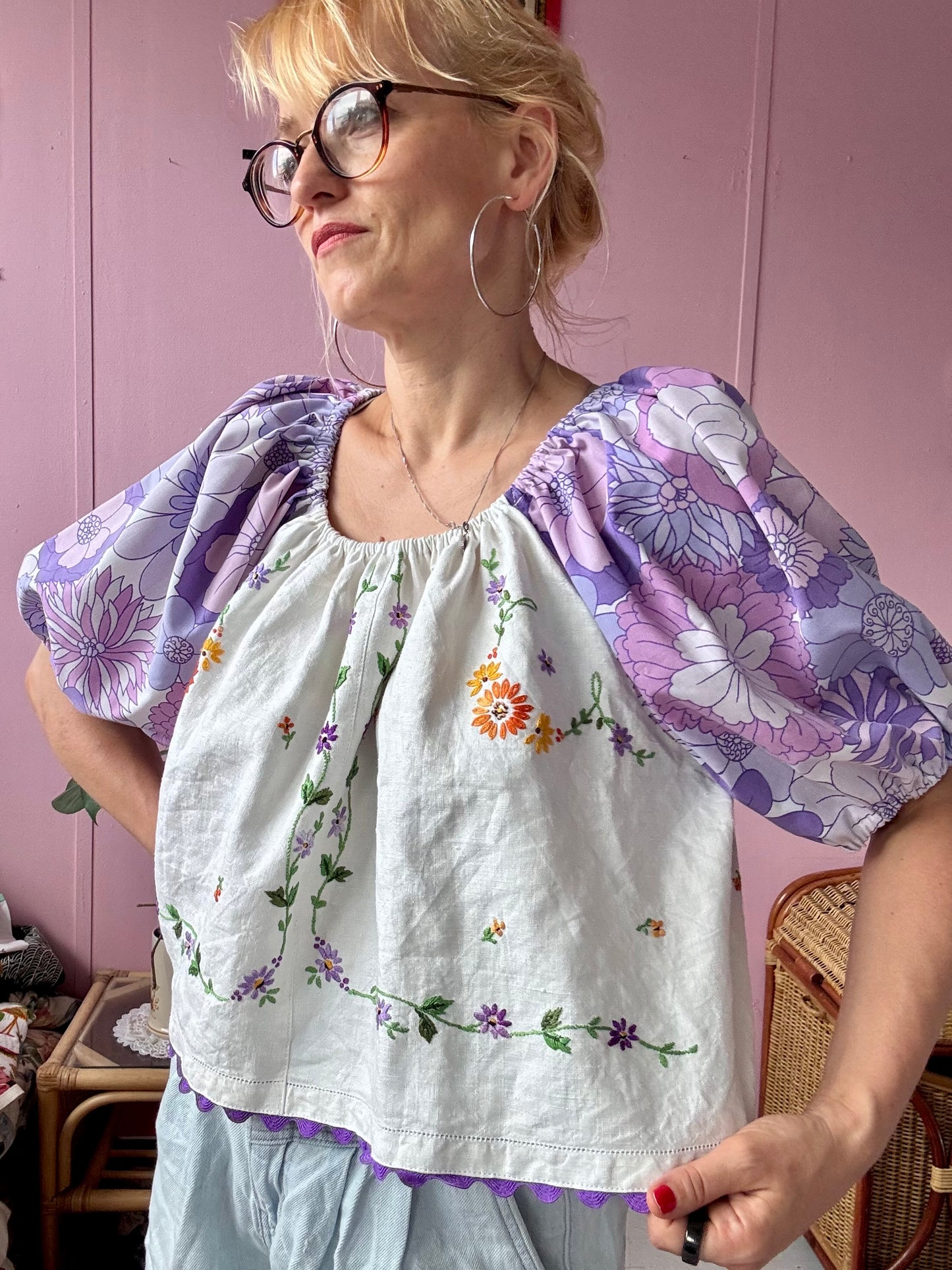 Floral blouse with purple floral sleeves