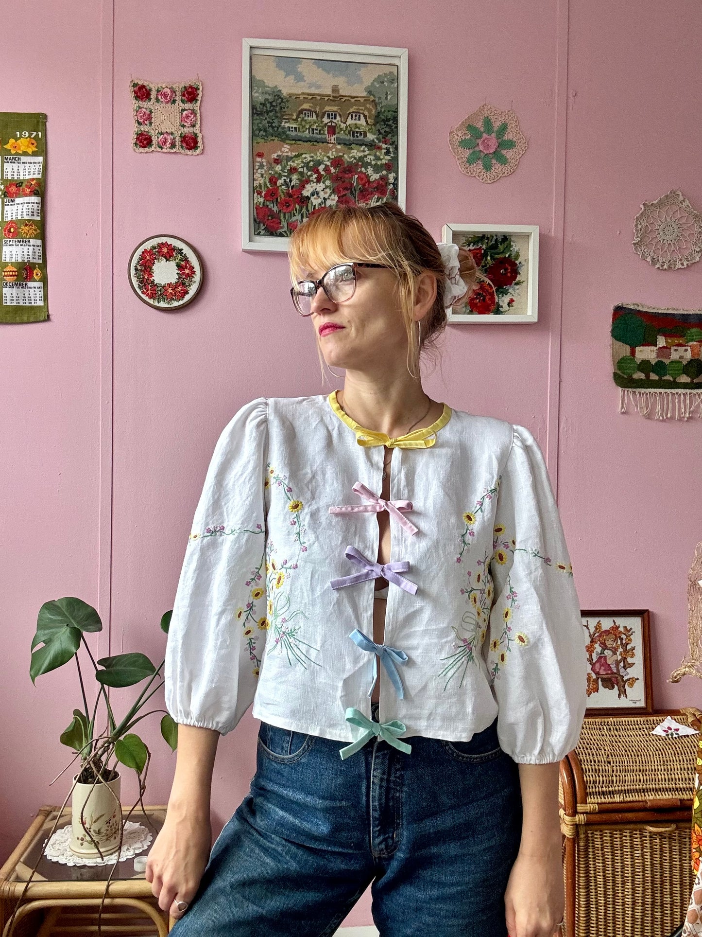 Linen blouse with yellow floral embroidery and rainbow bows
