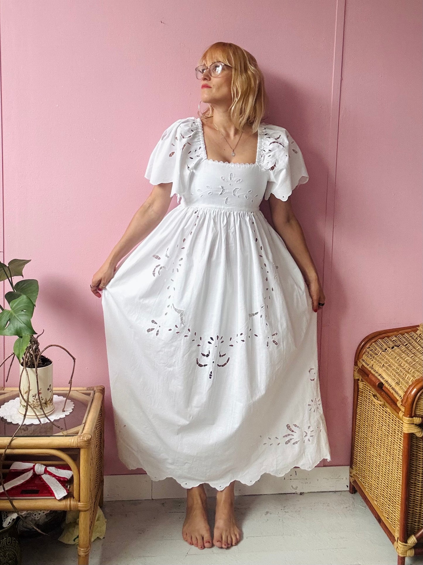 All white maxi dress with cut out embroidery