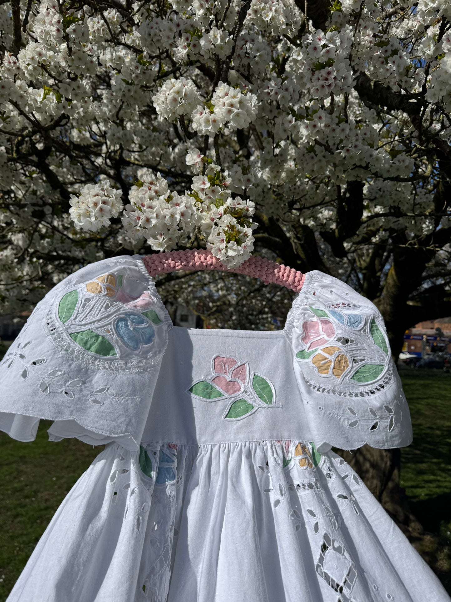 White maxi with pastel embroidery and cut out embroidery